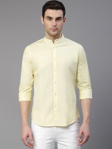 white pant and yellow shirt