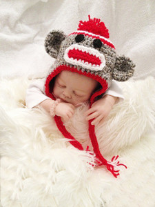 Cute NewBorn Baby in Monkey Cap 