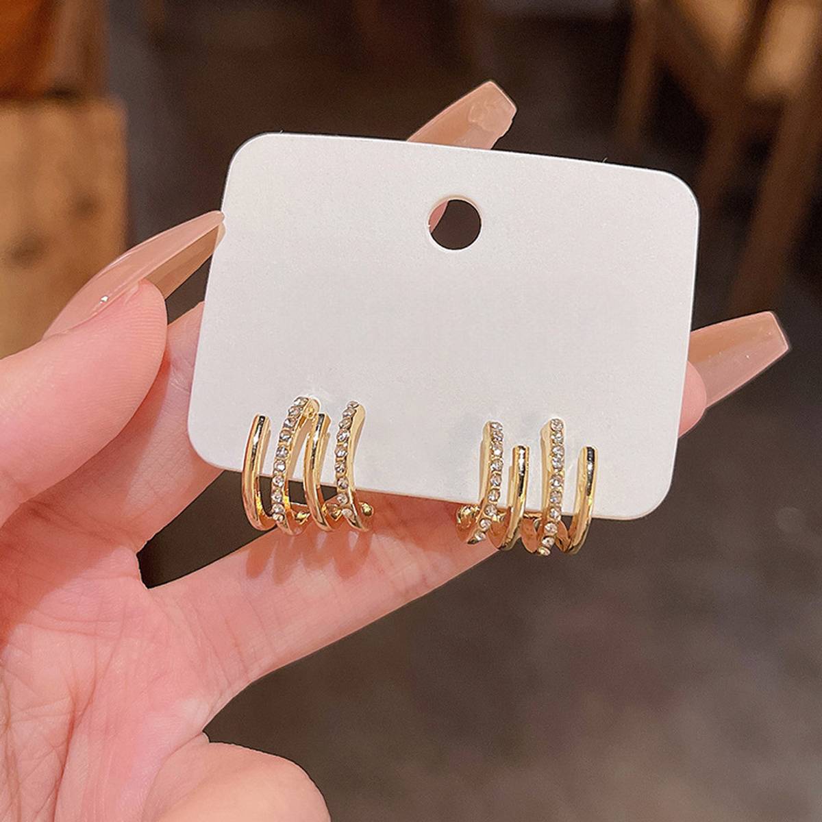 Vembley Gold Plated Cubic Zirconia 4 Effect Claw Stud Earrings For Women And Girls Cubic Zirconia Alloy Stud Earring — photo 4