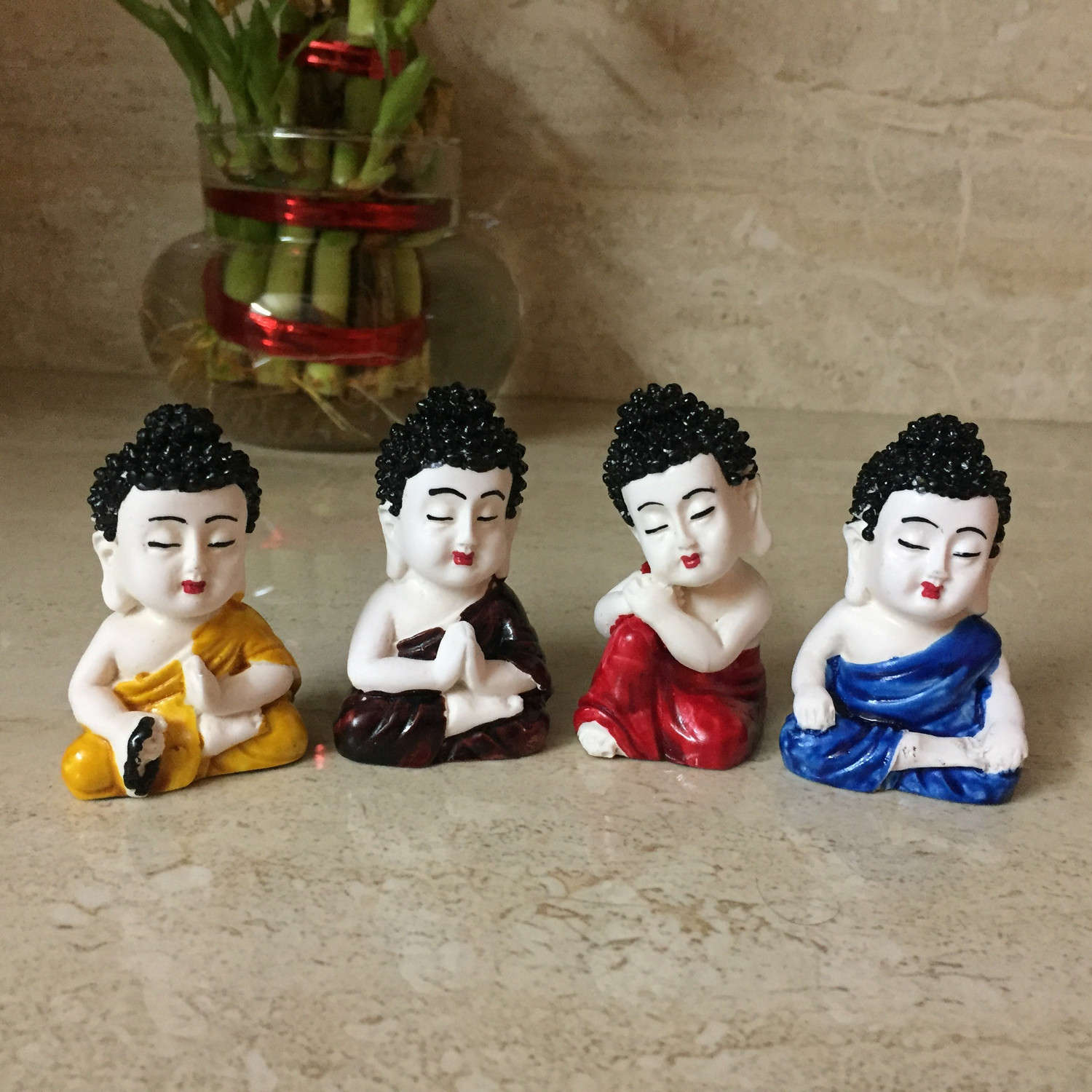Image of ACXSerene Multicolor 4 Baby Monks Buddha Figurines - for Car Dashboard | Home Decor| Office Decor| Chrismas Decor| Diwali Decor| Vaastu Decor| Fengshui Decorative Showpiece Decorative Showpiece - 2 cm