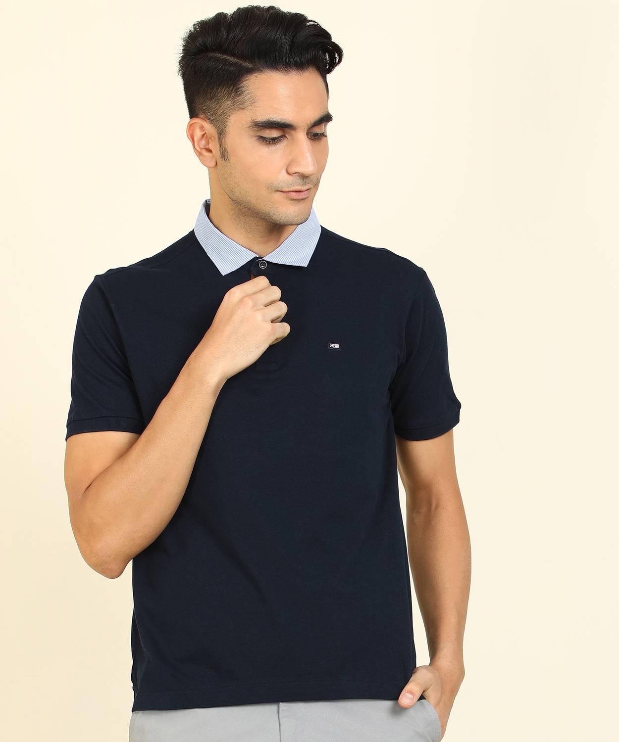 Arrow Sport Solid Men Polo Neck Dark Blue T-Shirt