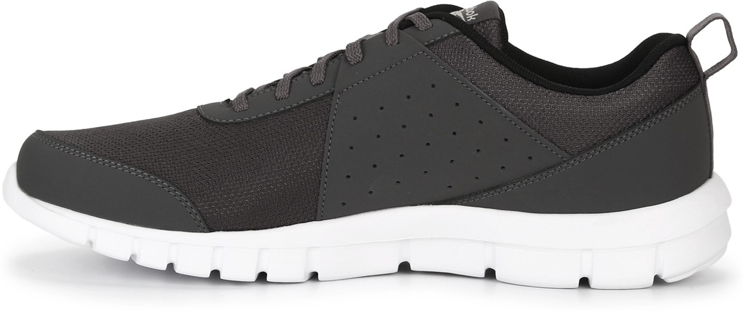 Image of REEBOK TRAVELLAR LP Running Shoes For Men