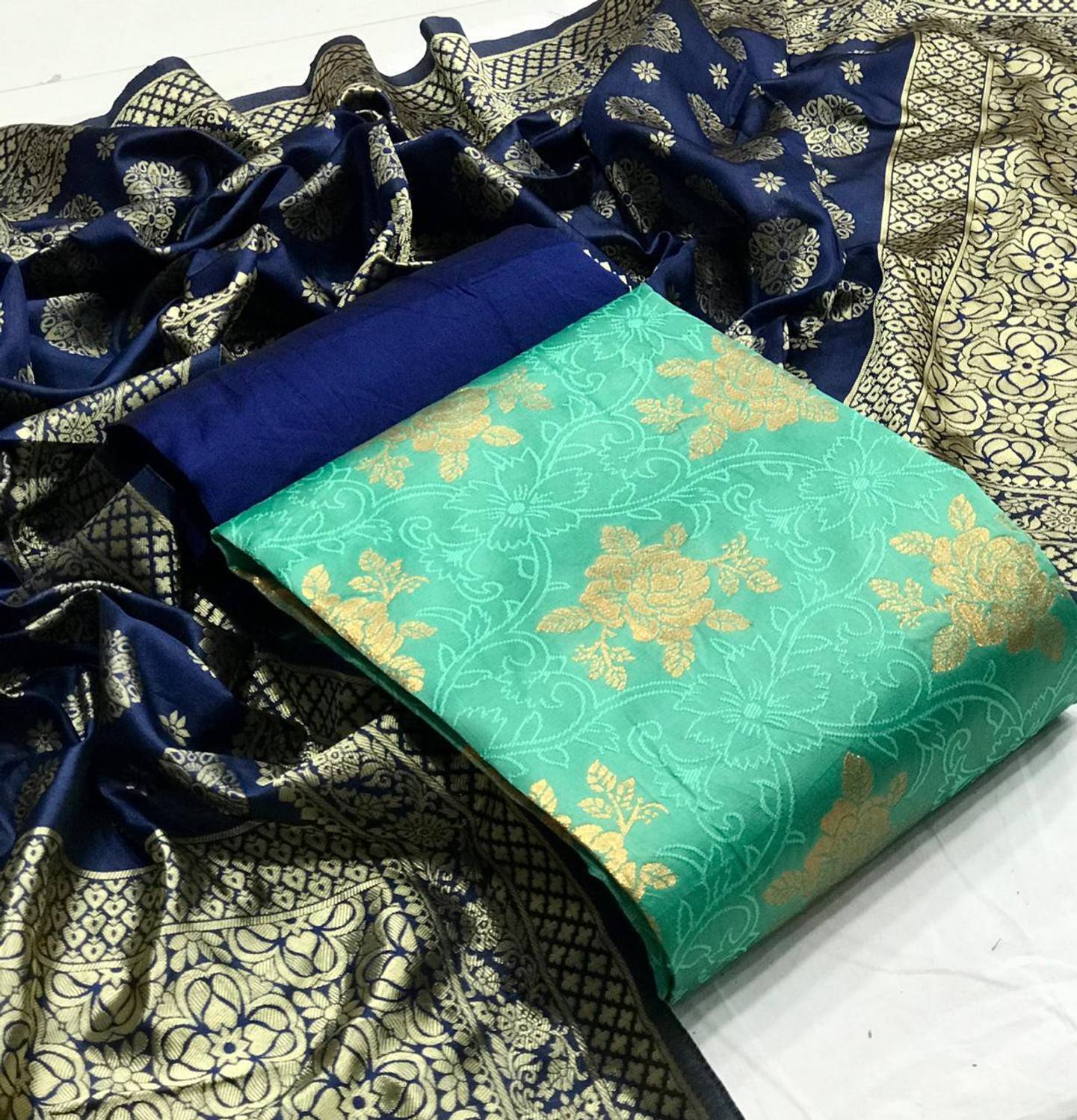 Dutt Textiles Silk Blend Self Design Salwar Suit Material