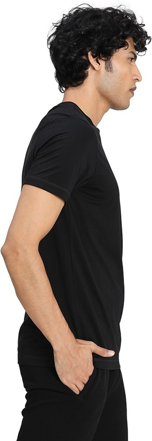 Image of PUMA Solid Men Round Neck Black T-Shirt