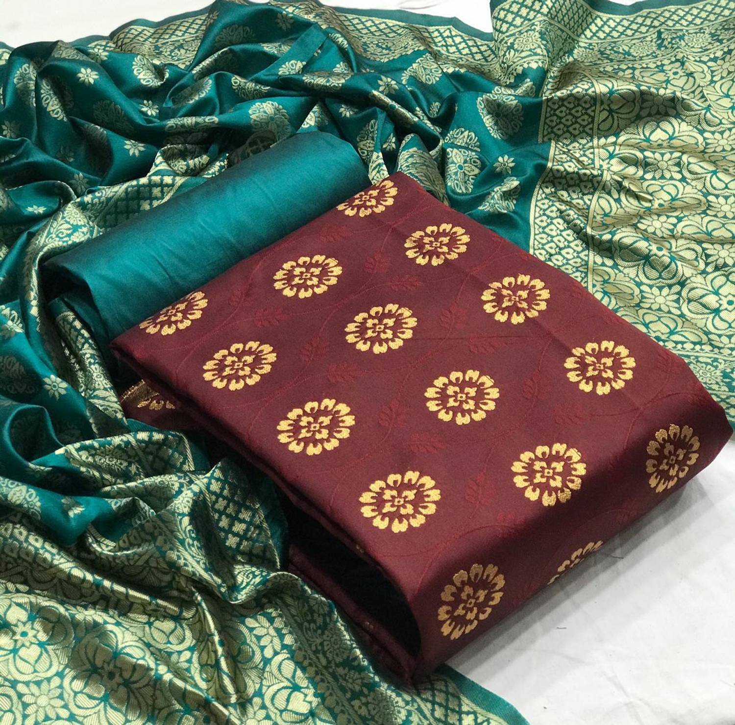 Dutt Textiles Silk Blend Self Design Salwar Suit Material