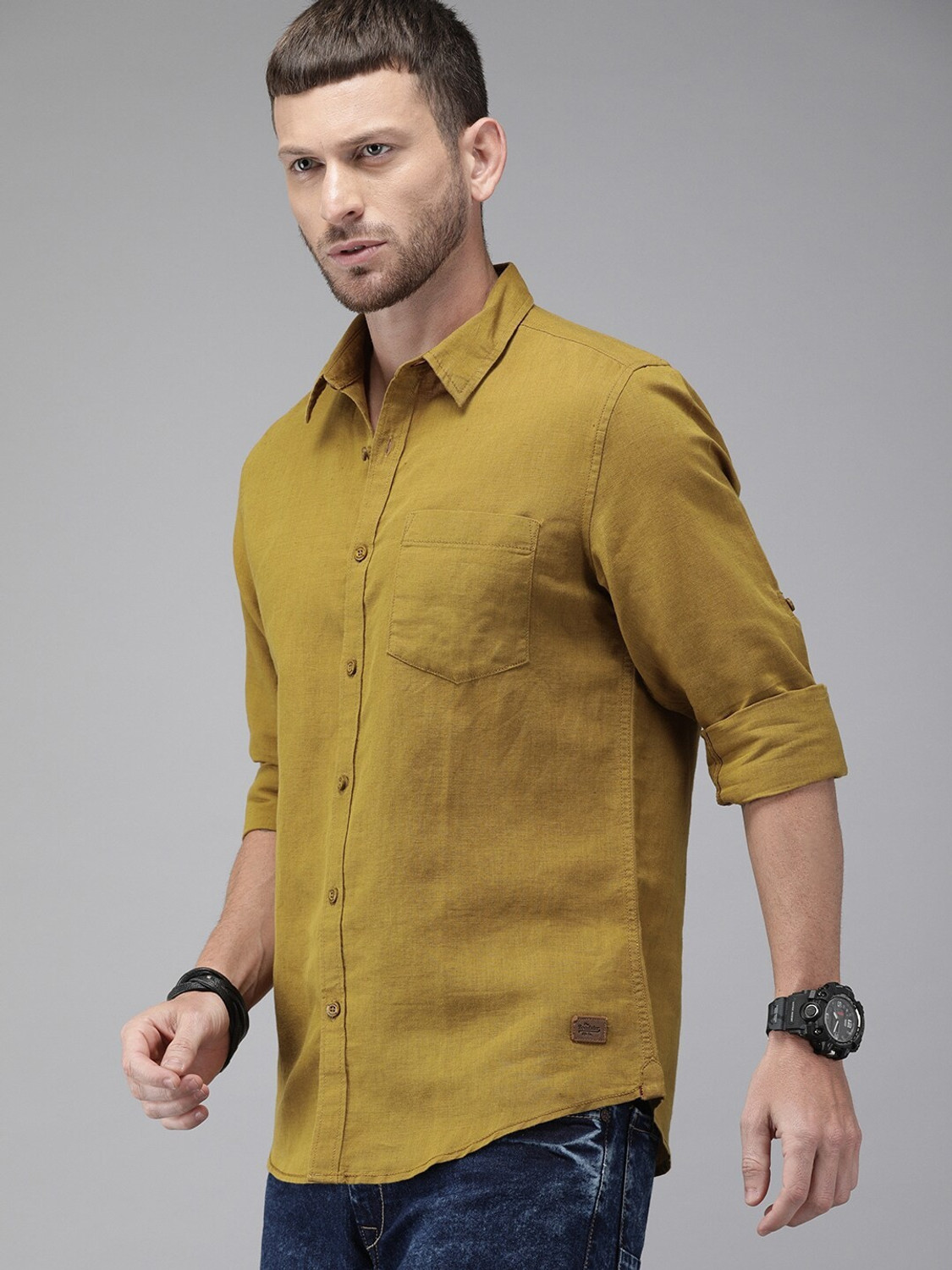 Image of Roadster Men Solid Casual Dark Green Shirt