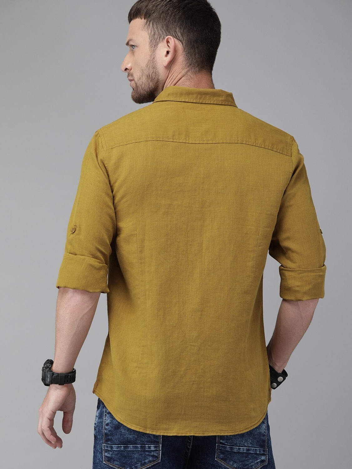 Image of Roadster Men Solid Casual Dark Green Shirt