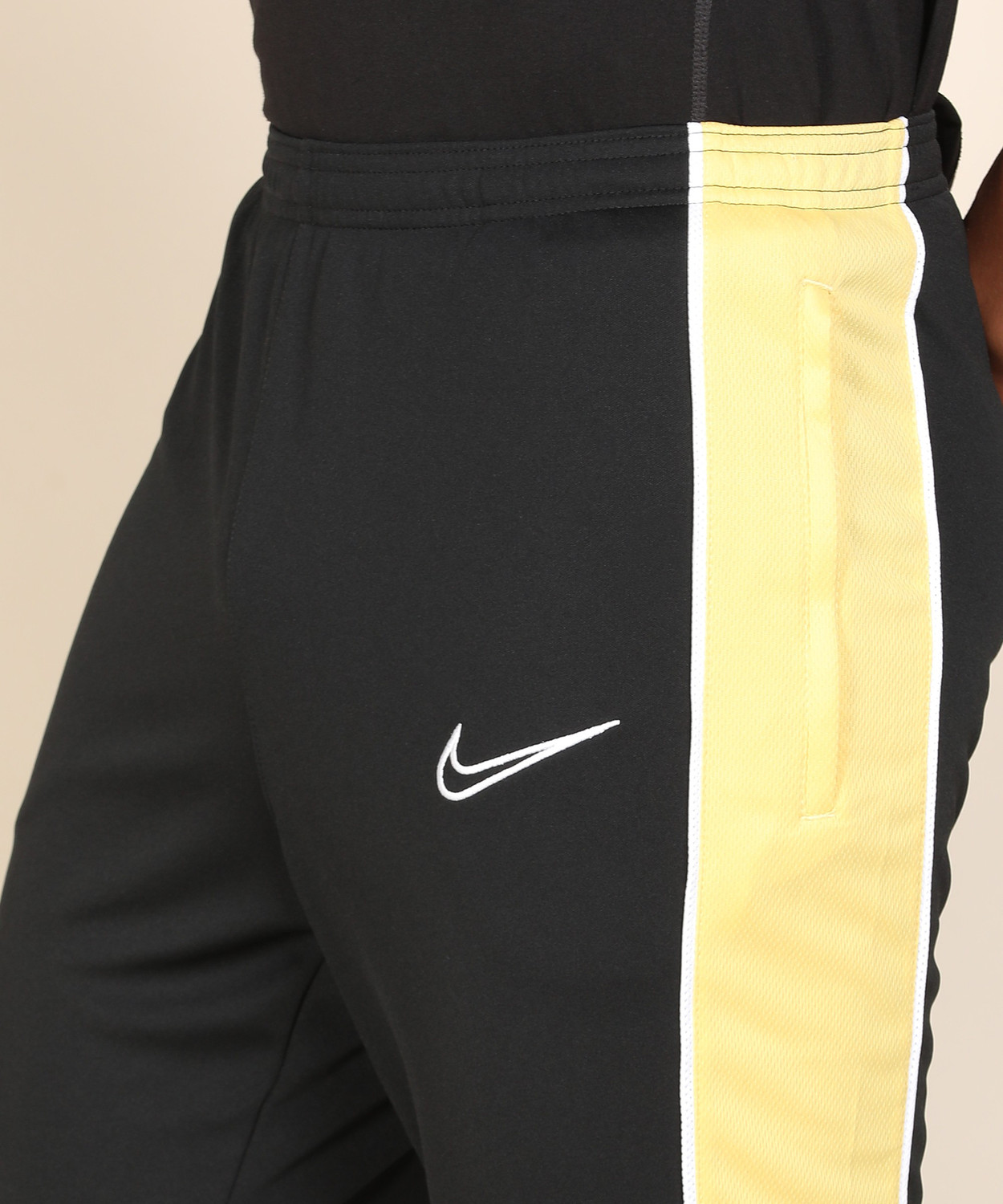 nike black and yellow joggers