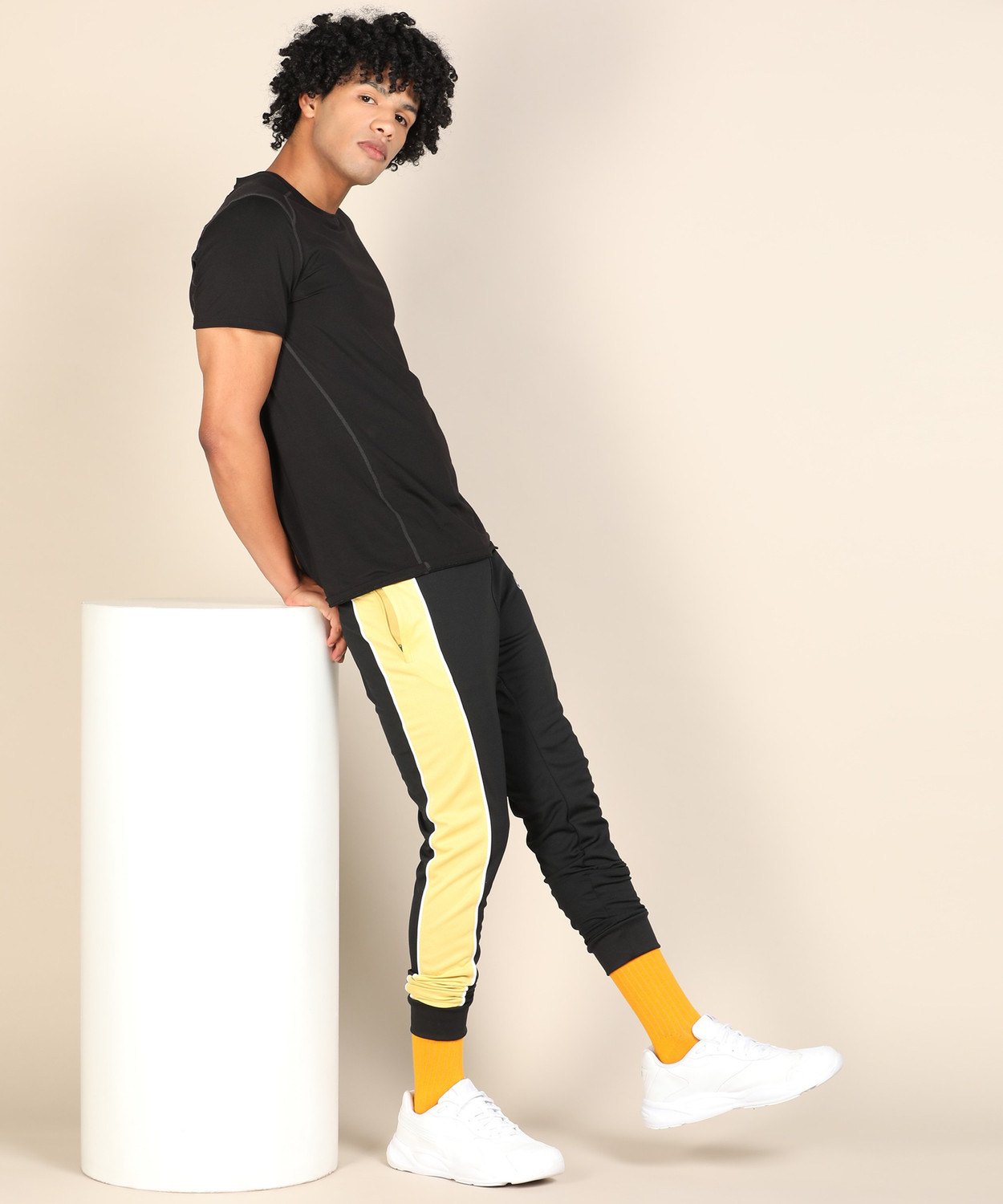 nike black and yellow joggers