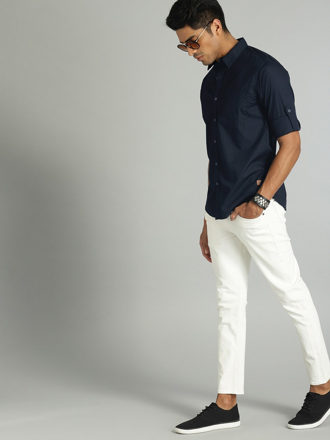 Image of Roadster Men Solid Casual Blue Shirt