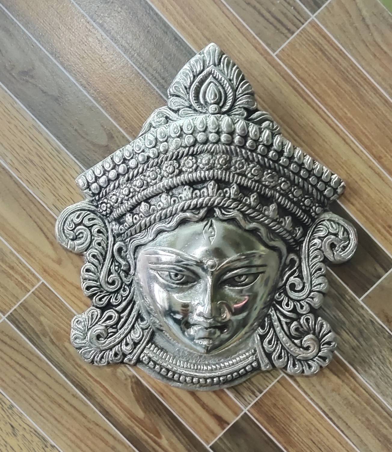 amishi blissful decor Amishi blissful decor Metal Goddess Durga Face Showpiece Wall Hanging Maa Durga maa durga Mask Idol Statue for Office Home Decor Evil Eye Protection maa durga Puja Antique face wall hanging (medium) Decorative Showpiece  -  18 cm