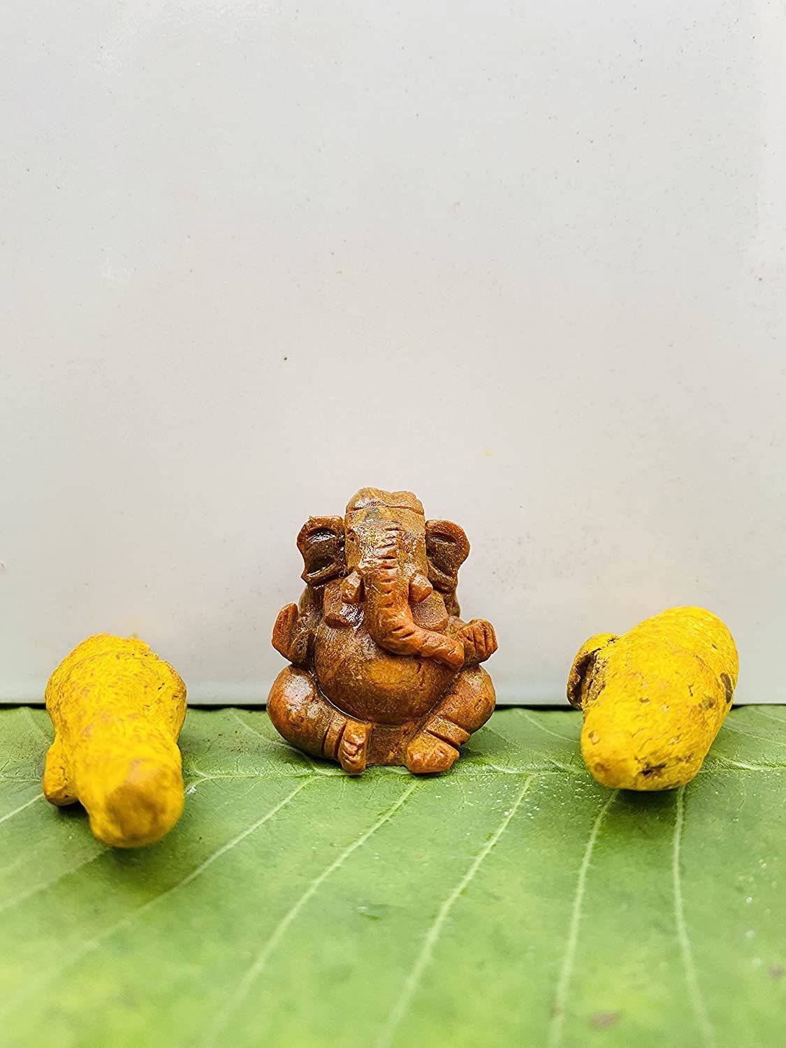 ANAWARIYAS Original Haldi Ganesha Idol | Ganesh ji Murti for Pooja and car Dashboard | Chaturbhuj Ganesha Idol | Ganesh Idol for Home Decor Decorative Showpiece  -  3 cm