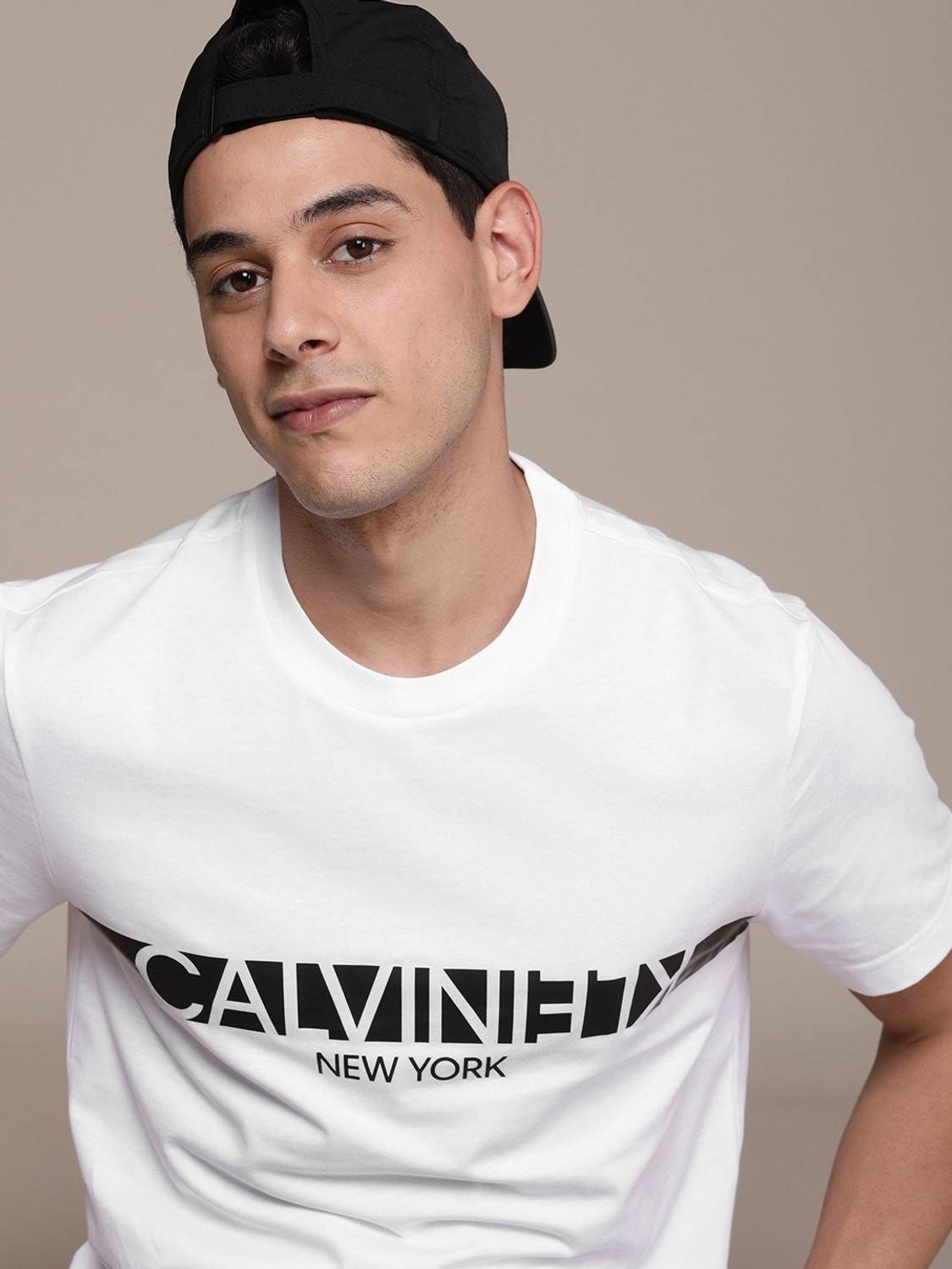 Calvin Klein Jeans Solid Men Round Neck White T-Shirt