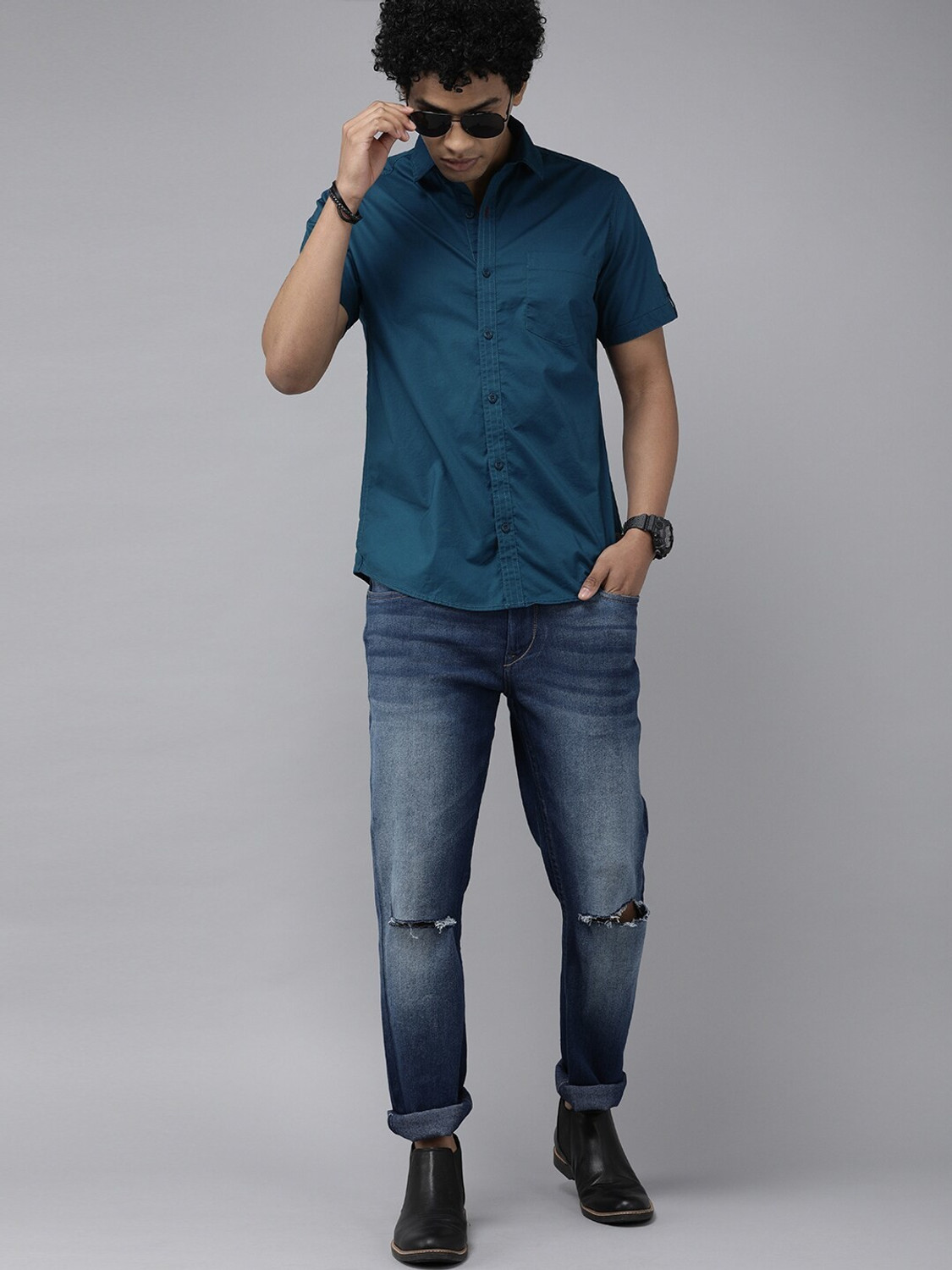 Image of Roadster Men Solid Casual Blue Shirt