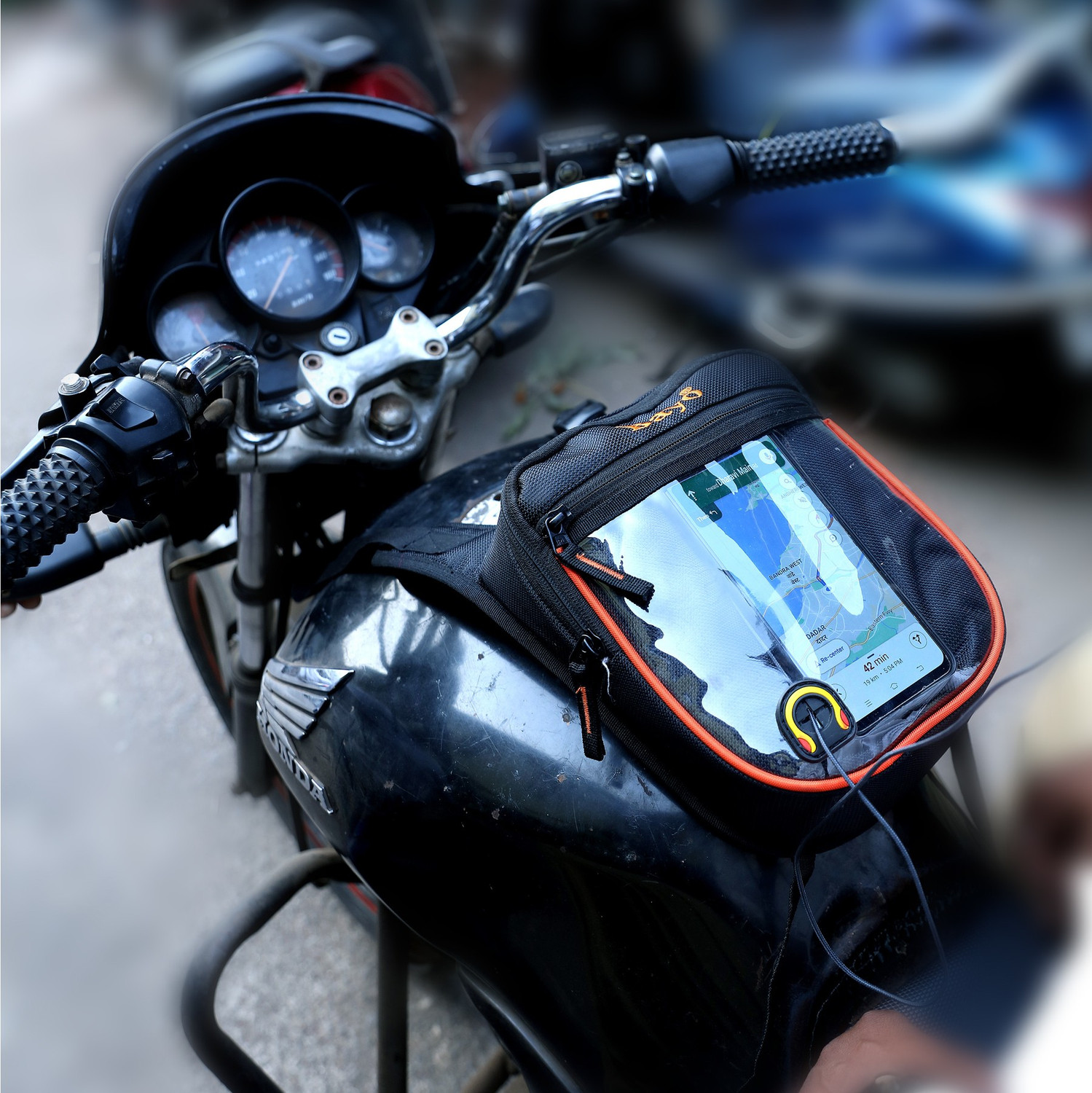 Image of bayo Black Heavy Quality Bike Tank Cover With Rain Cover Strap & Mobile Pocket For Royal Enfield Classic 350, Classic 500 & All Typs OF Bike Waterproof Tank Cover Strap Yamaha, Royal Enfield, KTM, Honda, TVS, Mahindra, Suzuki, Hero, BMW Pulsar 220 DTS-i, 800, WagonR, R15, Tavera, Super|Thunderbird Bike Tank Cover