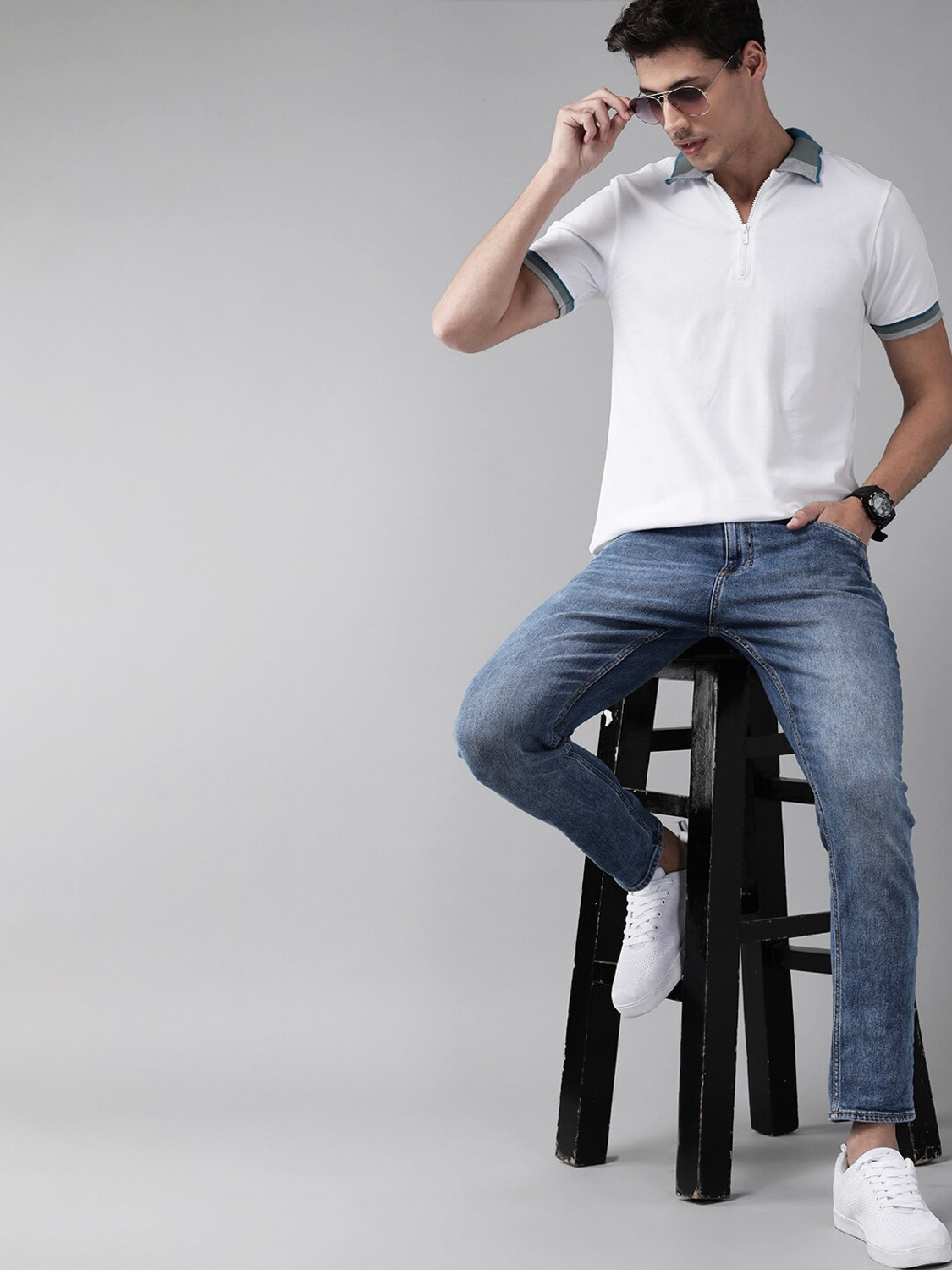 Image of Roadster Solid Men Polo Neck White T-Shirt