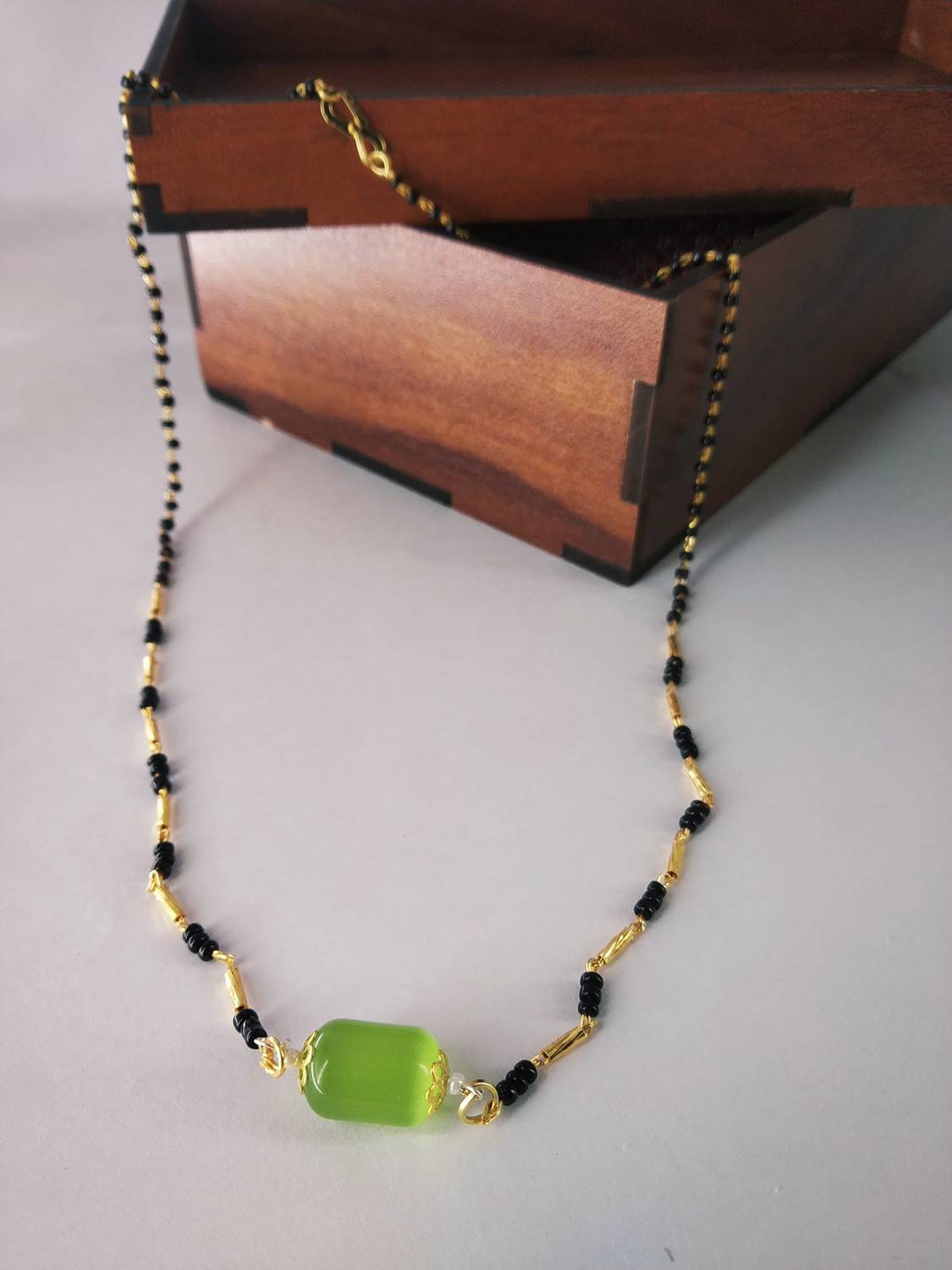 Aviman Creations Green crystal handcrafted mangalsutra set Brass Mangalsutra