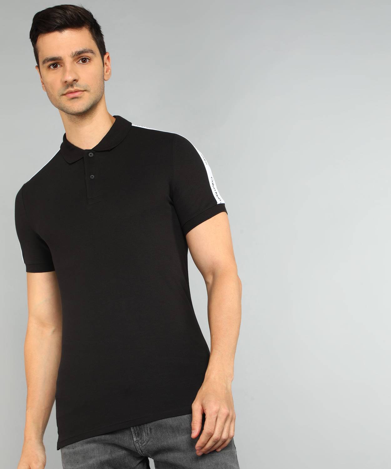 Calvin Klein Jeans Solid Men Polo Neck Black T-Shirt