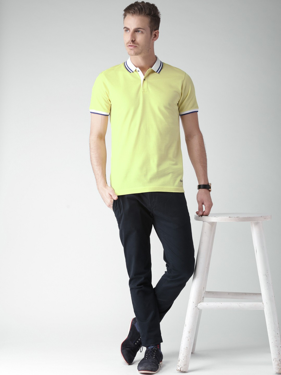 Image of INVICTUS Solid Men Polo Neck Yellow T-Shirt