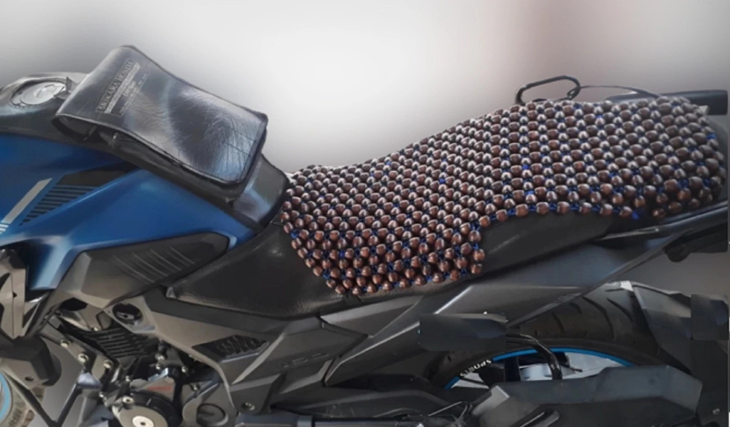 Image of Q1 Beads Acupuncture Design Wooden Beads Bike seat Cover -Full seat Cushion /air Cushion /Gel /seat pad for Bike & Scooty - Pack of 1 (L-Universal fit, Coffee Color) Single Bike Seat Cover For Yamaha, Suzuki, Hero, TVS, Royal Enfield, Honda, Bajaj, Kinetic Avenger 160, Activa 6G, Pleasure, Access 125, Bullet Classic, Maestro Edge, Aviator, Apache RTR 160, Pulsar, CB Shine, Passion Pro, Unicorn, Splendor Plus, Thunder Bird 500, Maestro