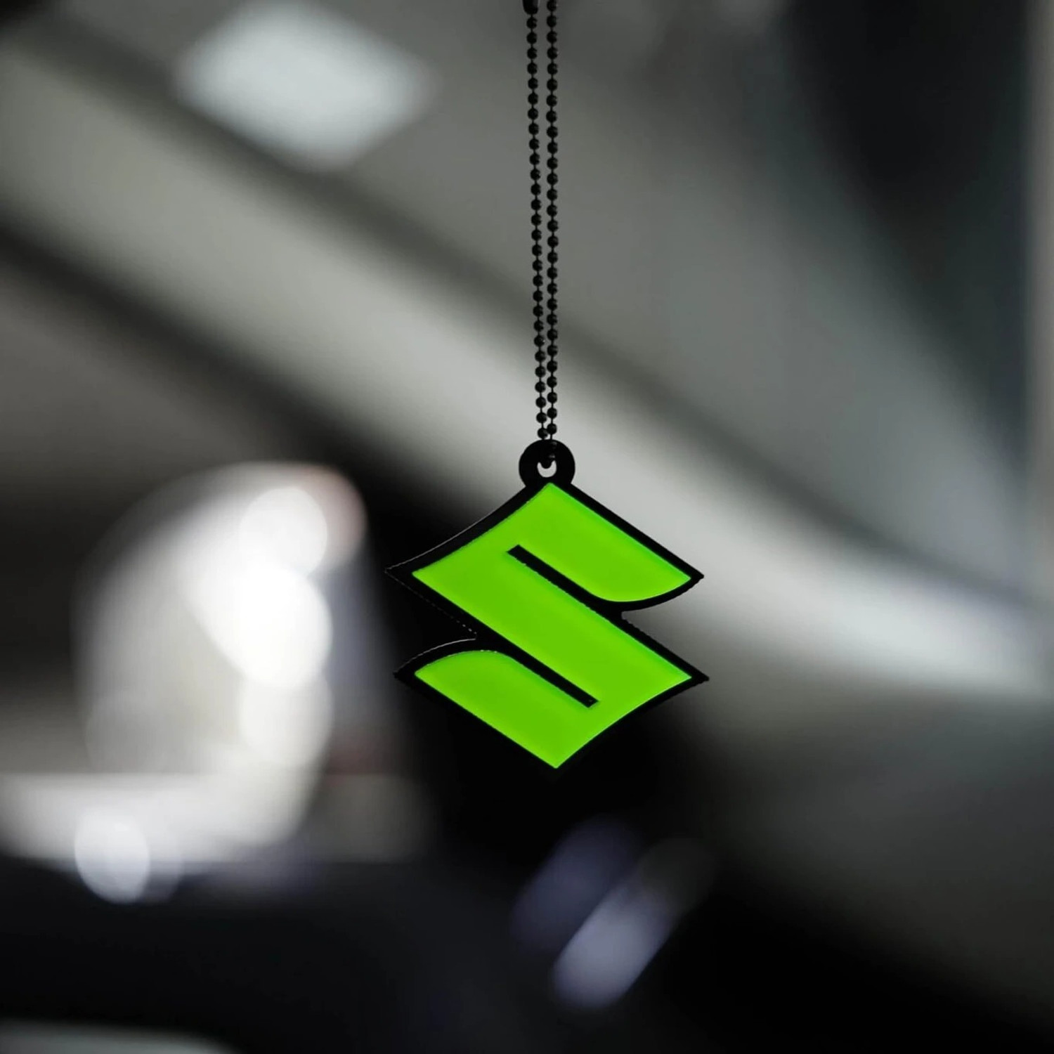 Image of MYZAH Premium Suzuki 3D logo Green fluorescent car Mirror Hanging with metal chain Car Hanging Ornament (Pack of 1)