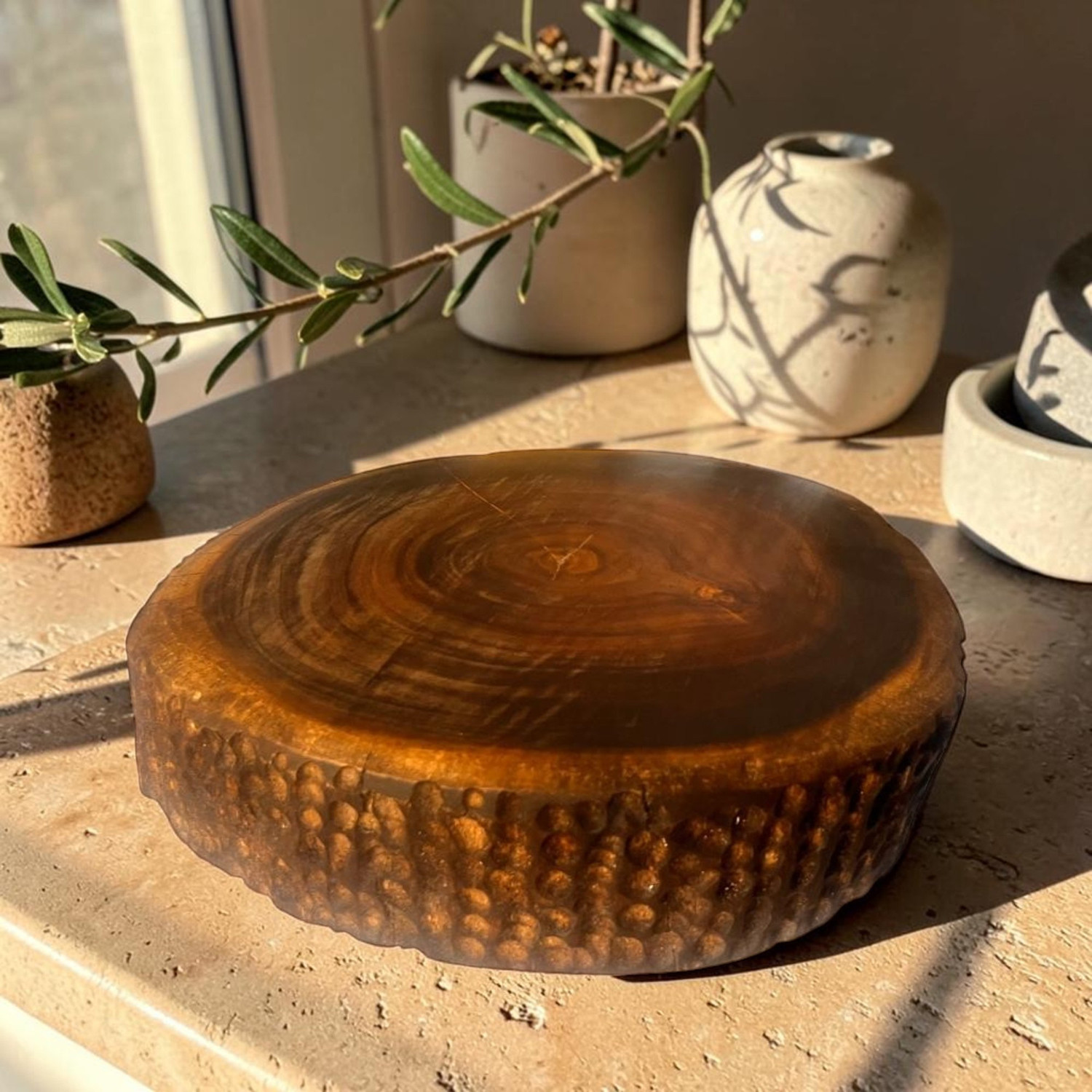 Image of Hutson Micklyn sheehsam wood round chopping board. Wooden Cutting Board