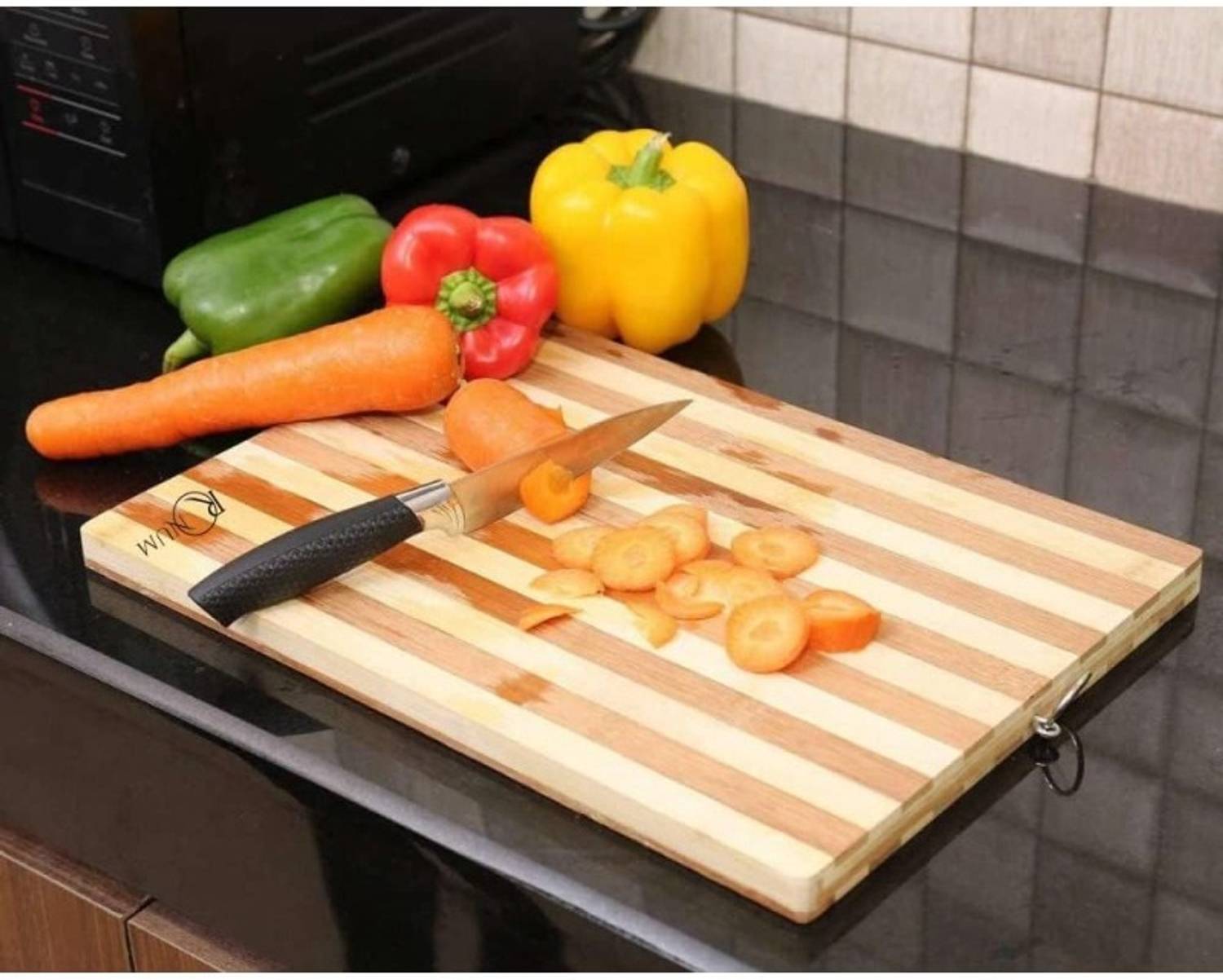 AriseShop Items Included: 1 Natural Wood Chopping Board with Stainless Steel Ring Wooden Cutting Board