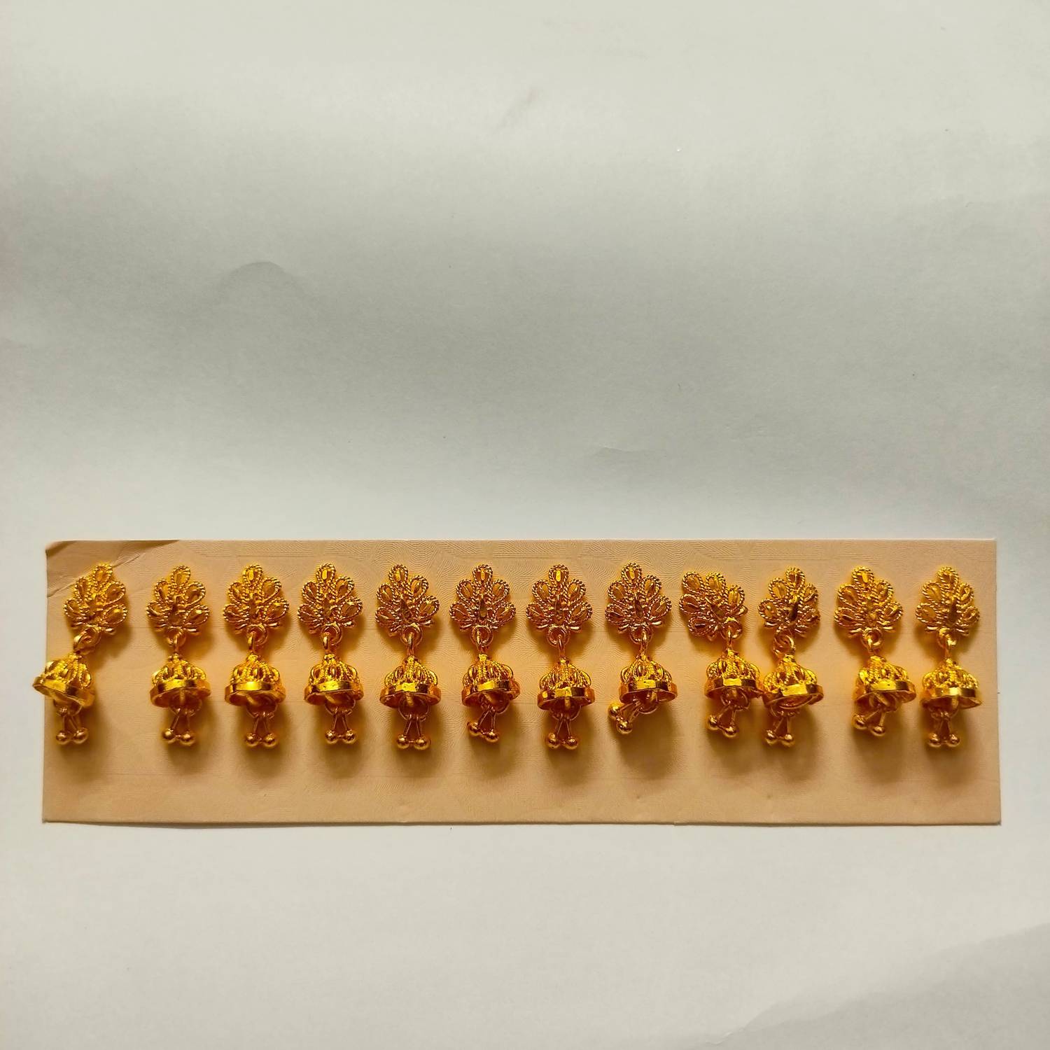 Any Fashion Plastic Earring Set of 12– Laddu Gopal Kundal Diamond earring Deity Ornament