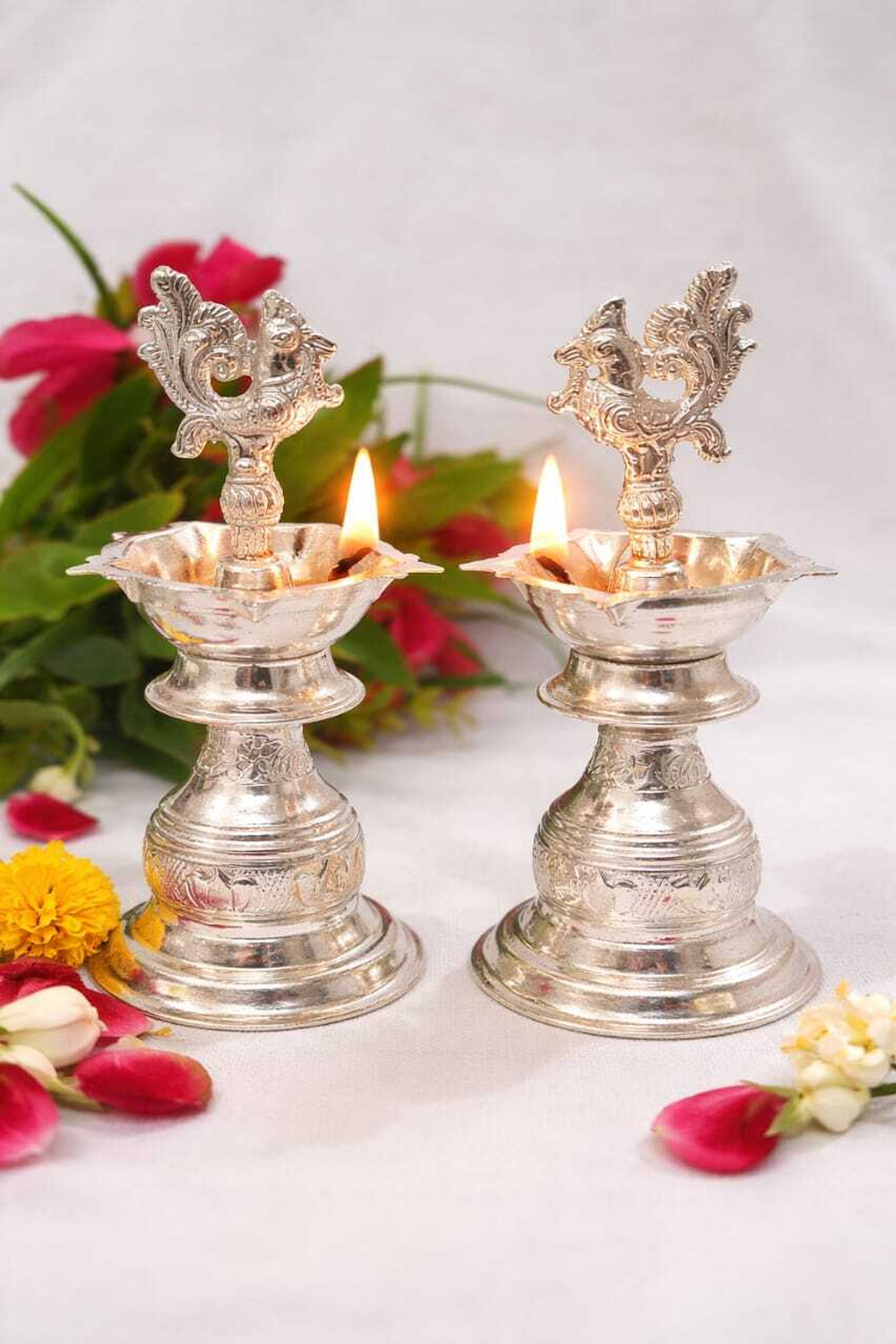Image of Samukkaras Fashion Samukkaras Pure German Silver Peacock Design Kuthuvilakku set for Home Silver (Pack of 2) Table Diya Set