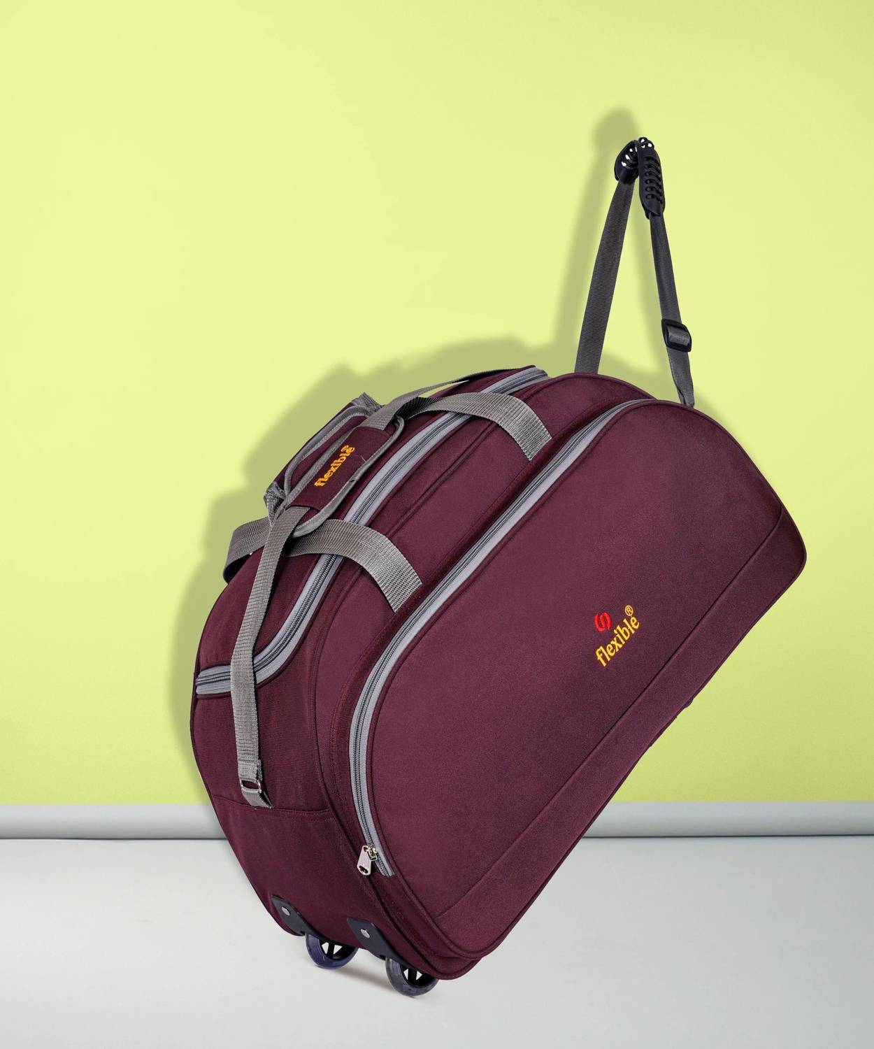 Flexible (Expandable) FB Luggage duffel bag with wheels(Purple, 60L) Duffel With Wheels (Strolley)