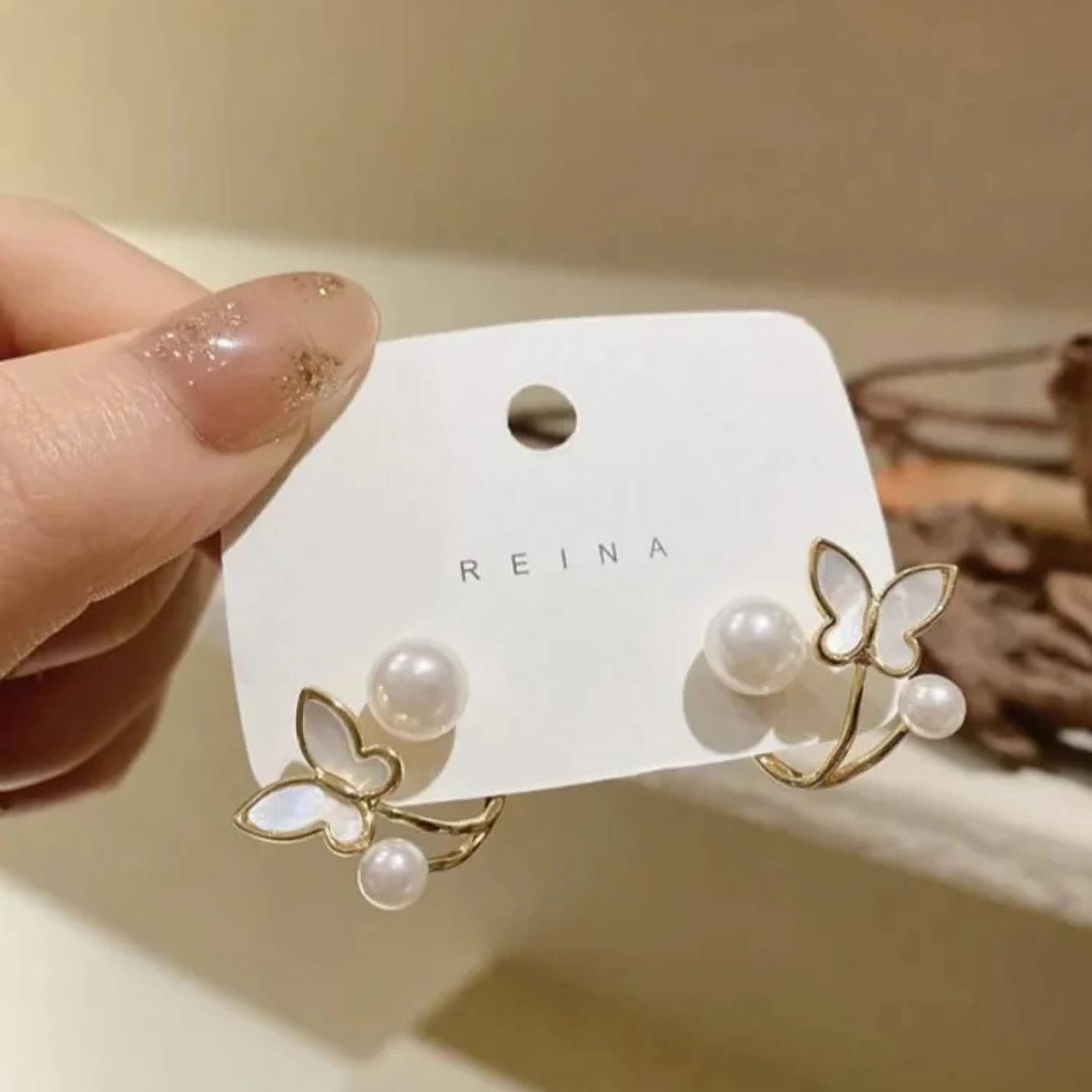 BLINKLOOK Korean Pearl Butterfly Stud Earrings – Elegant Gift for Girls & Women Alloy Stud Earring