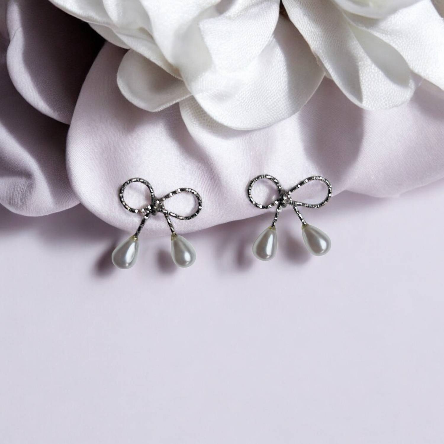 Artistic Bliss Stylish Korean Pearl Bow Stud Earrings for Girls & Women Beads Alloy Drops & Danglers