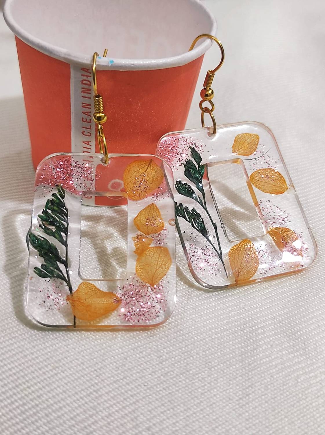advikacreation Leaf base earring Resin Tassel Earring, Jhumki Earring, Hoop Earring, Drops & Danglers