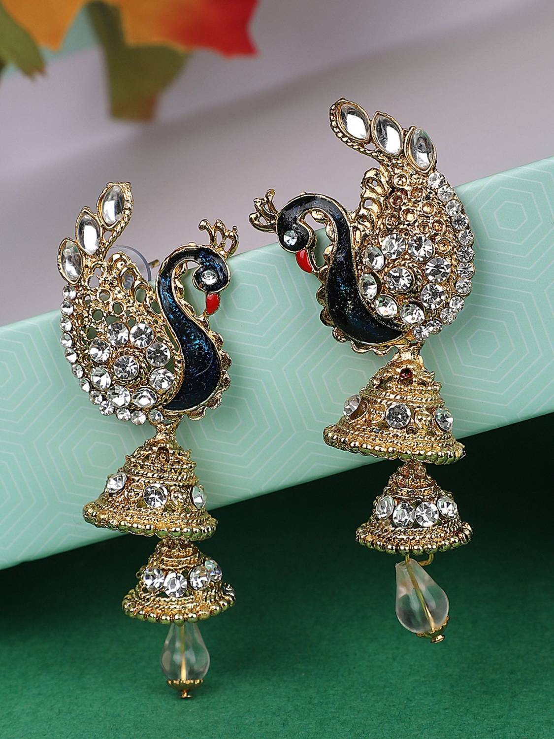Anika's Creation Traditional Peacock Shape White Stone Studded 2 Floor Jhumka Earring_ANIK Cubic Zirconia Brass Jhumki Earring