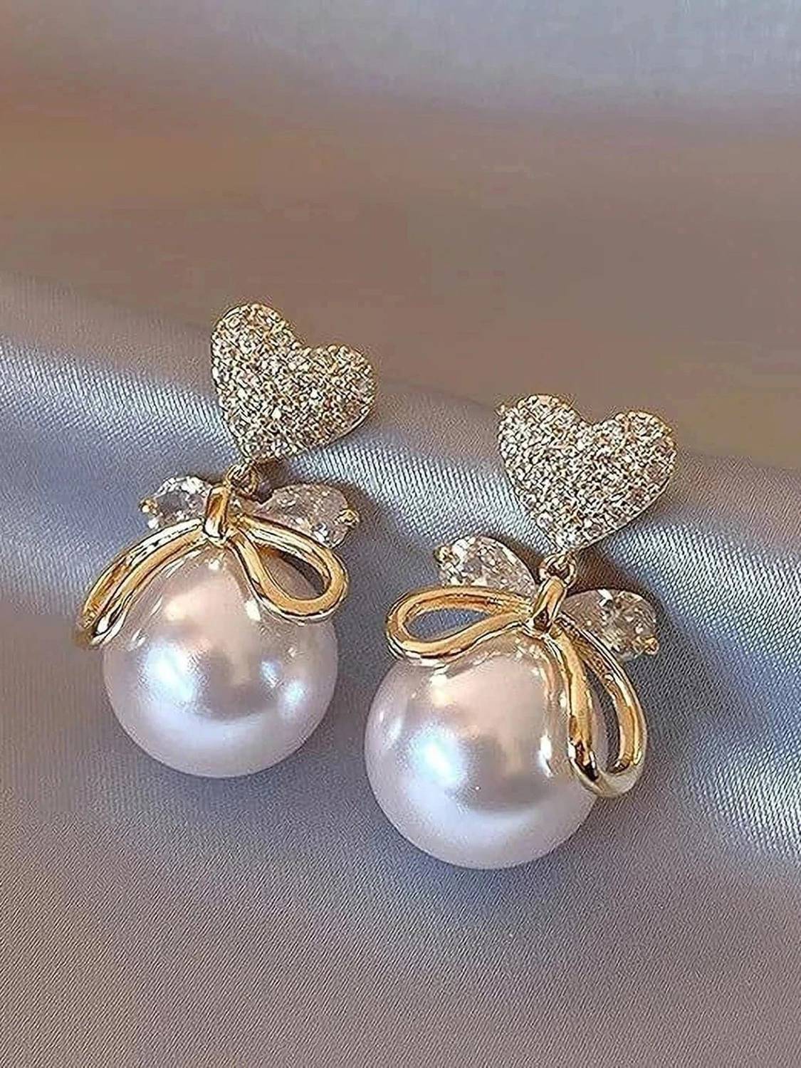 AainaByParul White Pearl V Shaped Pearl Alloy Drops & Danglers