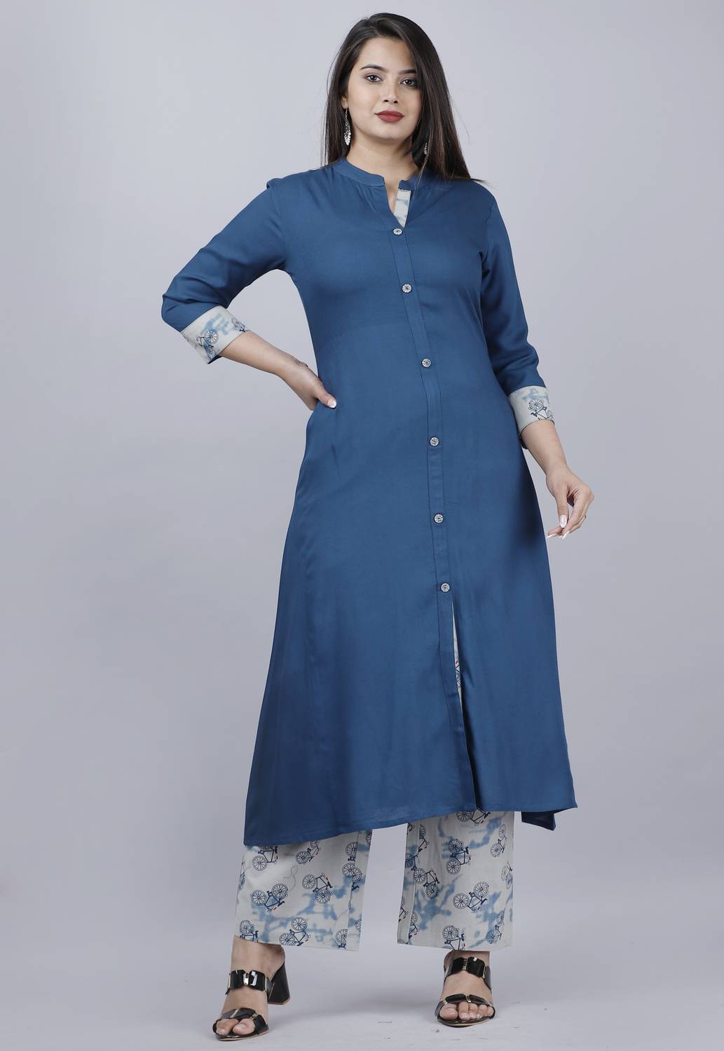 Ankhnoor Women Kurta Palazzo Set