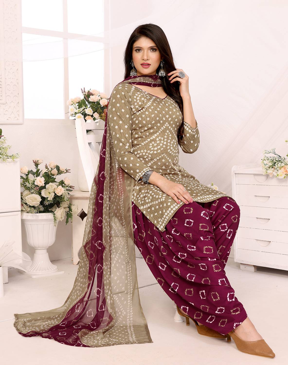 The Aumki Crepe Printed Salwar Suit Material