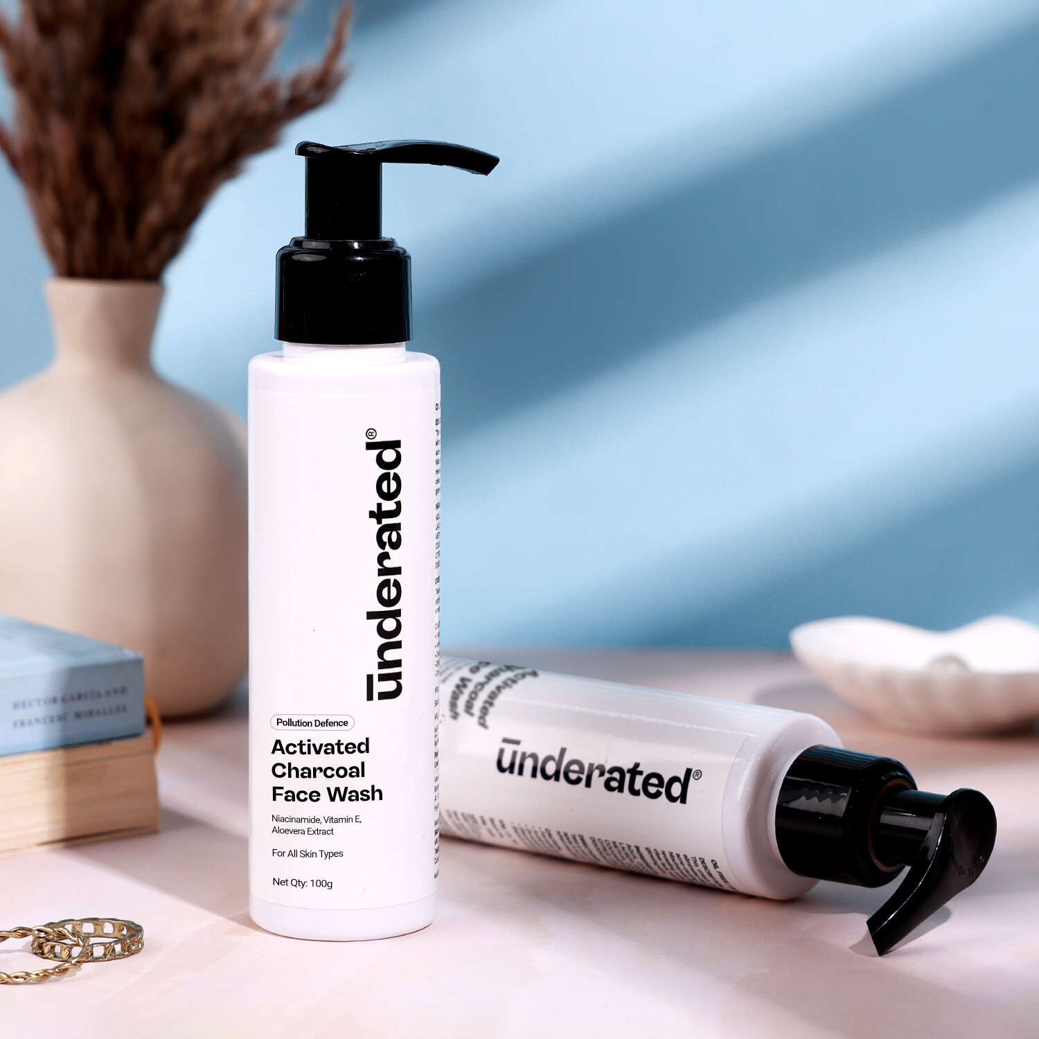 Image of UNDERATED Activated Charcoal Pollution Defence | Deep Cleansing & Oil Control | With Niacinamide, Vitamin E, & Aloe Vera Extract | Unclogs Pores & Detoxifies Skin | For All Skin Types Face Wash