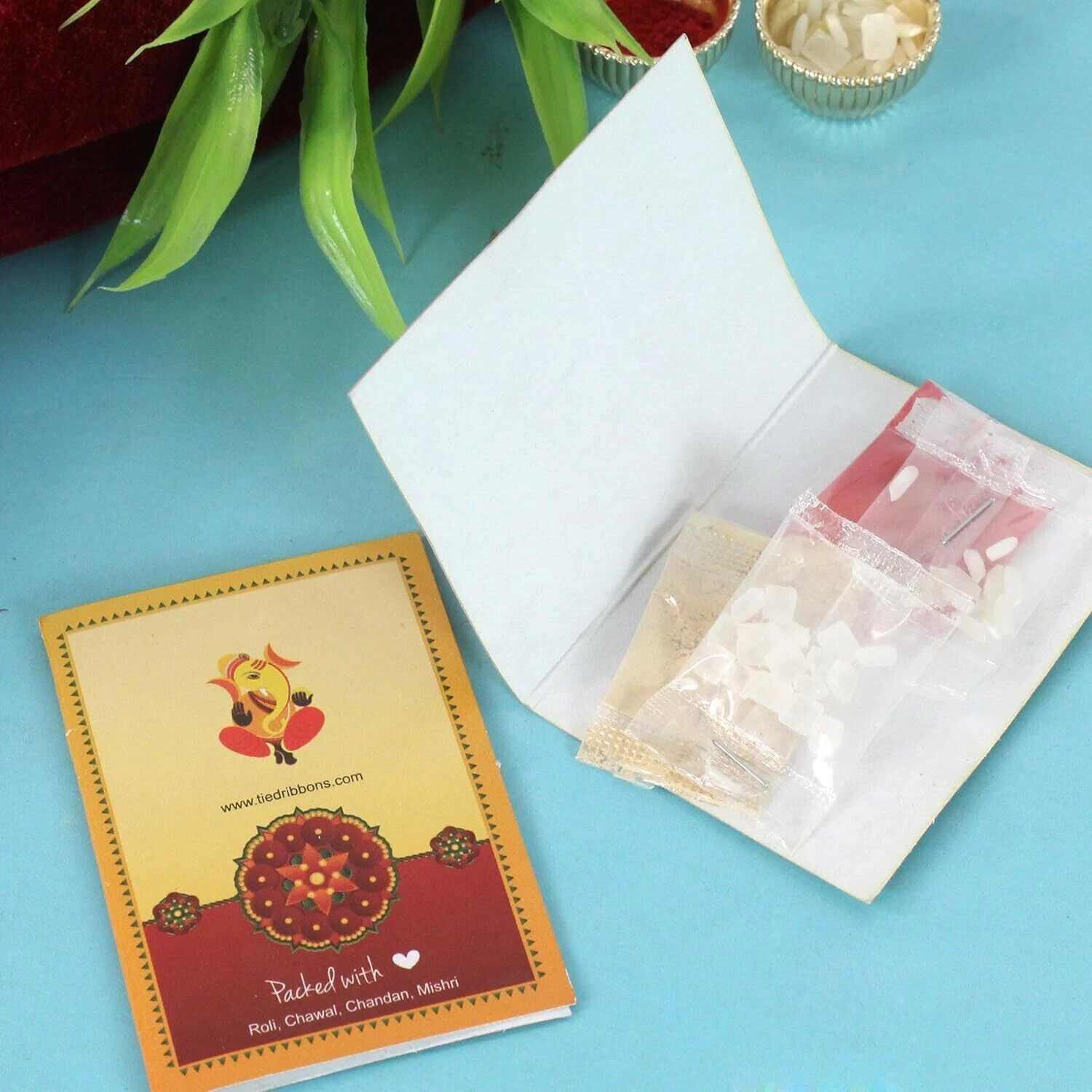 Image of TIED RIBBONS Rakhi Gift for Bhaiya and Bhabhi with Sweets - Lumba Rakhi with Amul Kaju Katli Assorted Gift Box