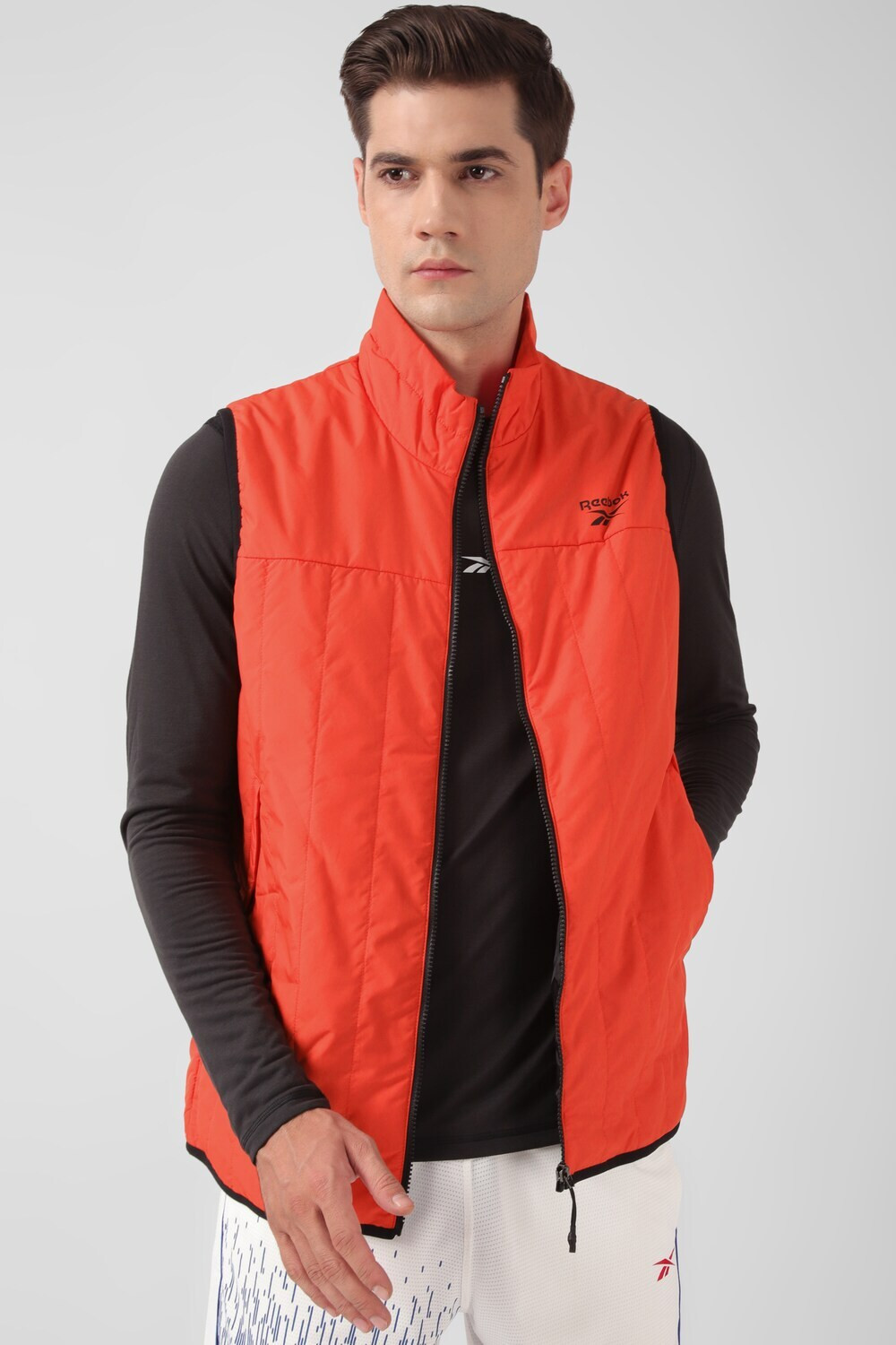 Image of REEBOK Sleeveless Solid Men Jacket