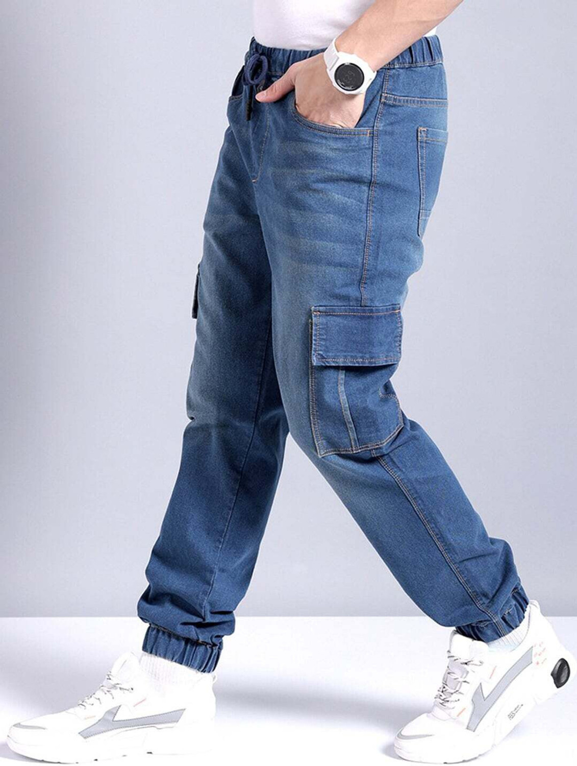 Image of The Indian Garage Co. Men Jogger Fit Mid Rise Blue Jeans