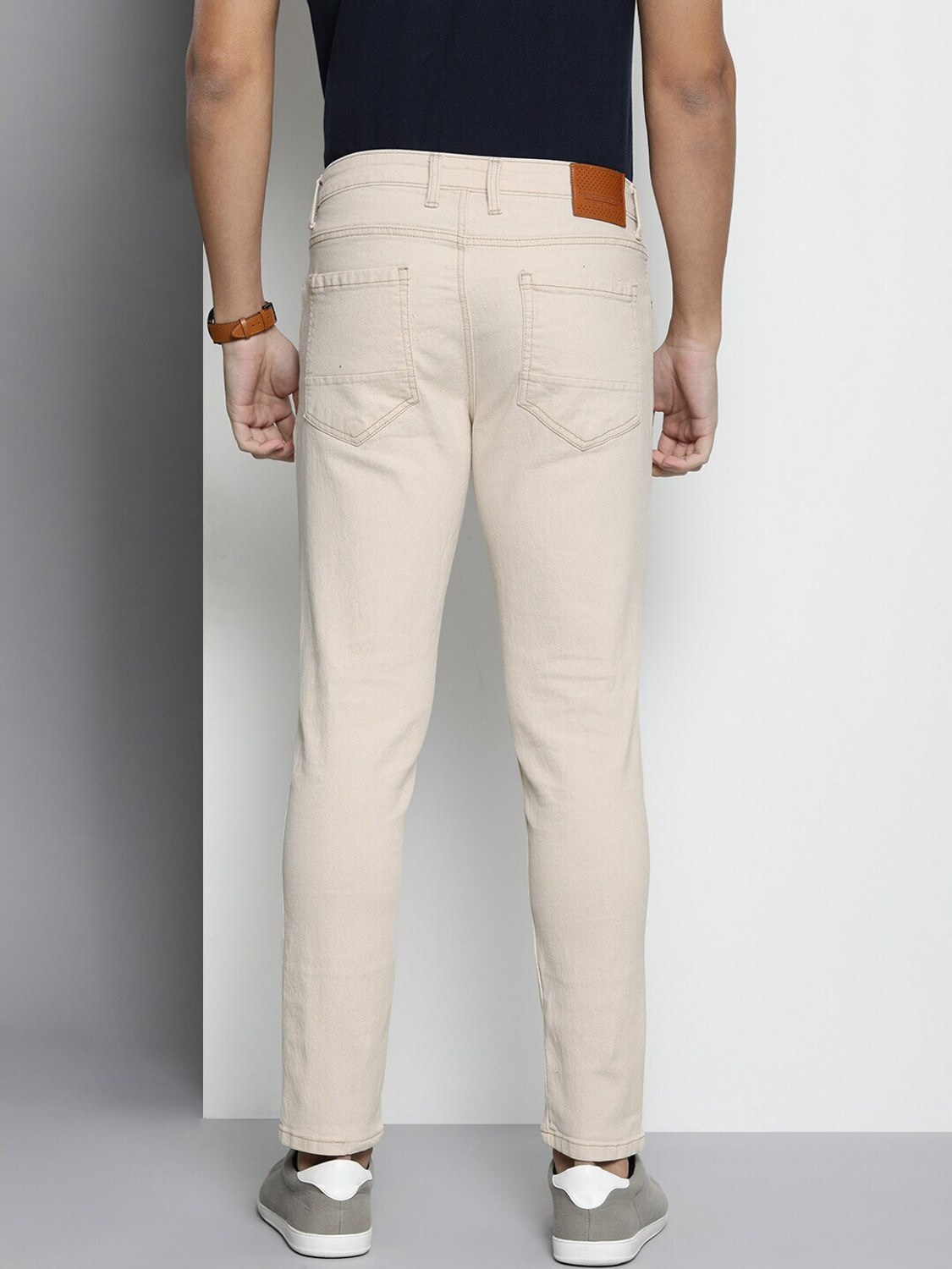 Image of The Indian Garage Co. Carrot Fit Tapered Fit Men White Jeans