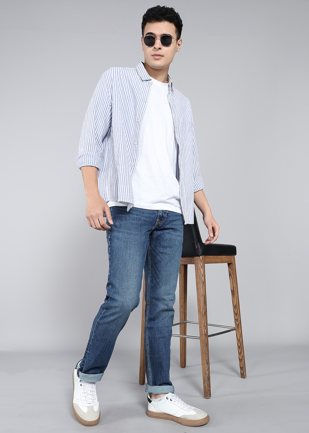 Image of U.S. Polo Assn. Denim Co. Men Tapered Fit Mid Rise Blue Jeans