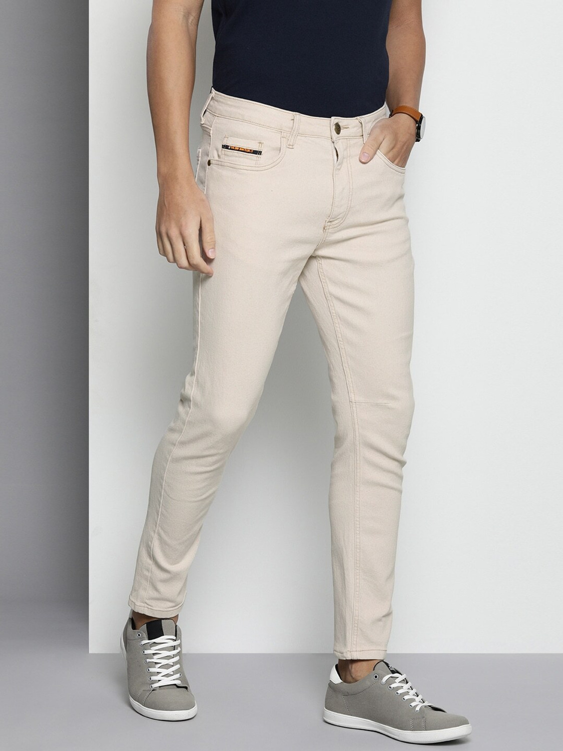 Image of The Indian Garage Co. Carrot Fit Tapered Fit Men White Jeans