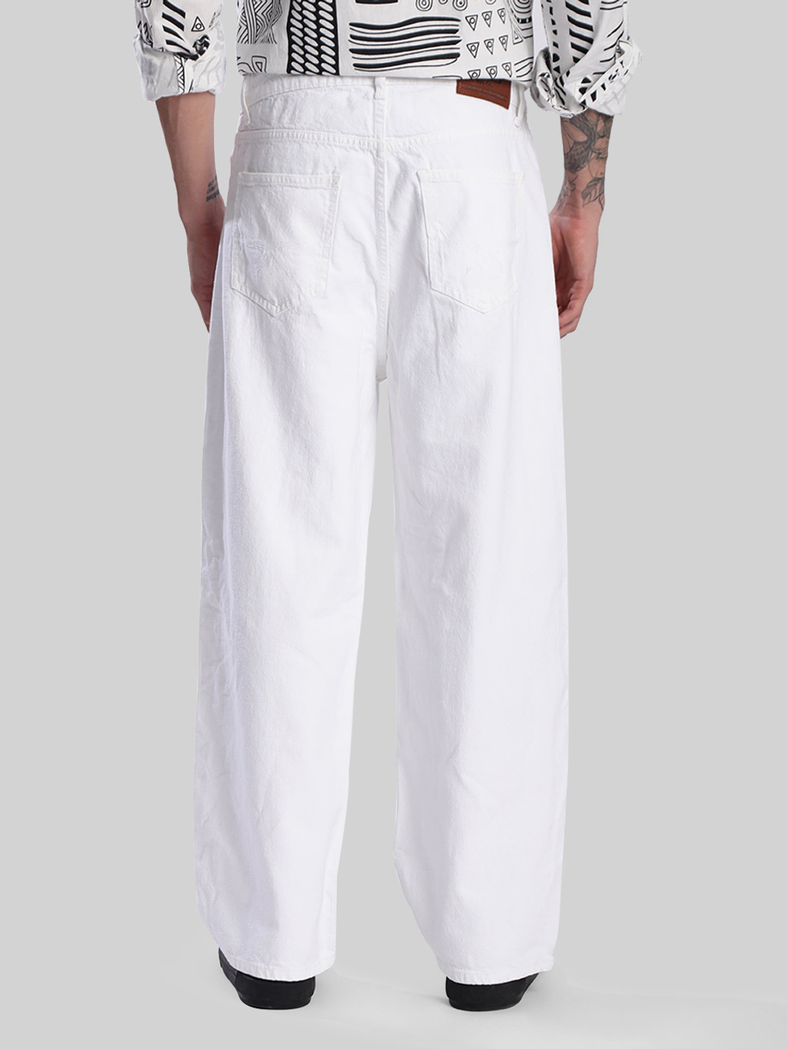 Image of Roadster Men Loose Fit Mid Rise White Jeans
