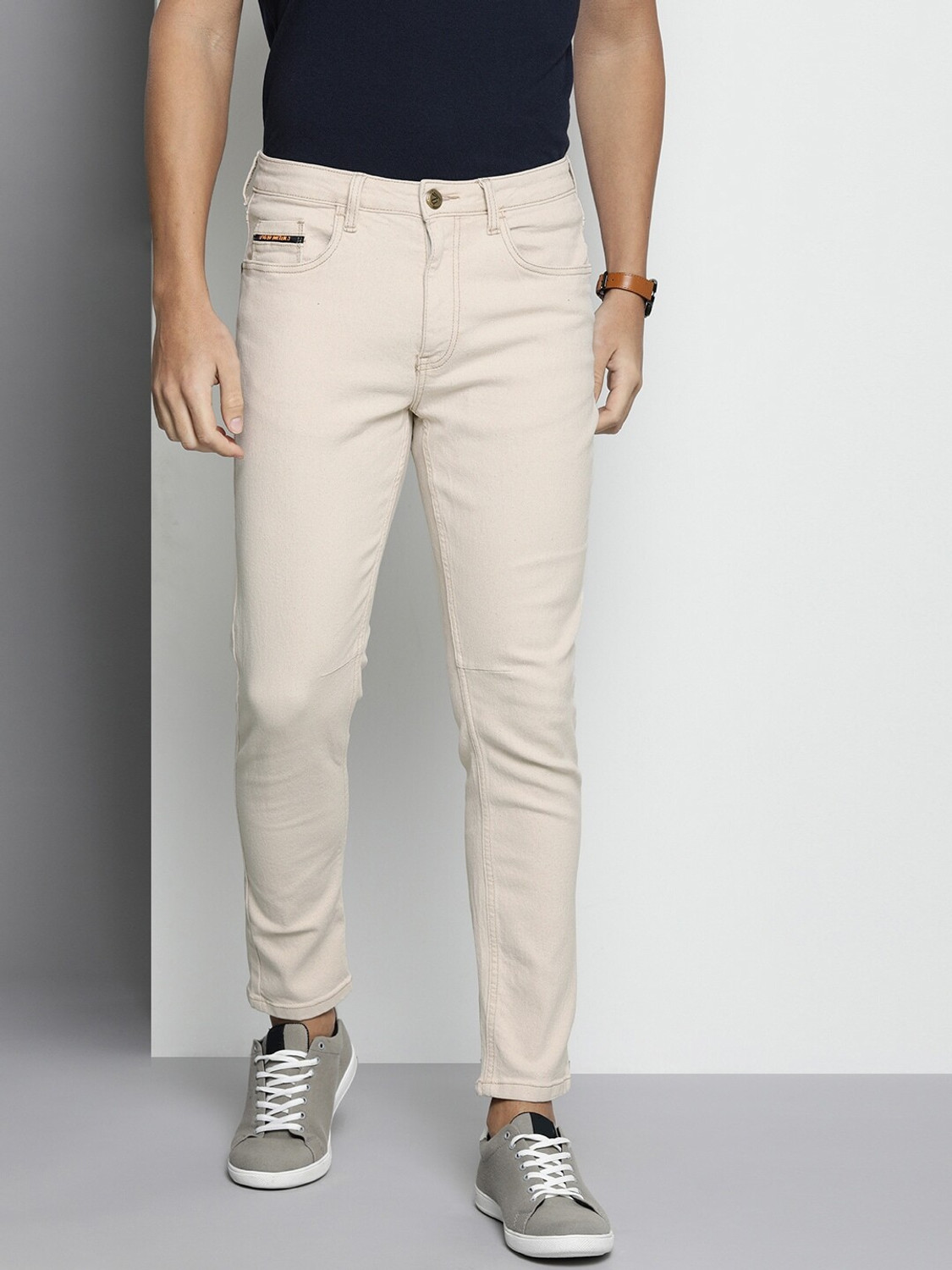Image of The Indian Garage Co. Carrot Fit Tapered Fit Men White Jeans