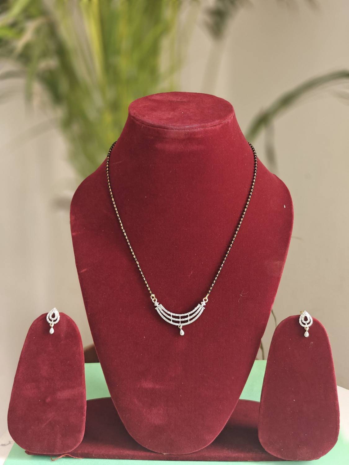 Atrisha Alloy Gold-plated White, Black Jewellery Set