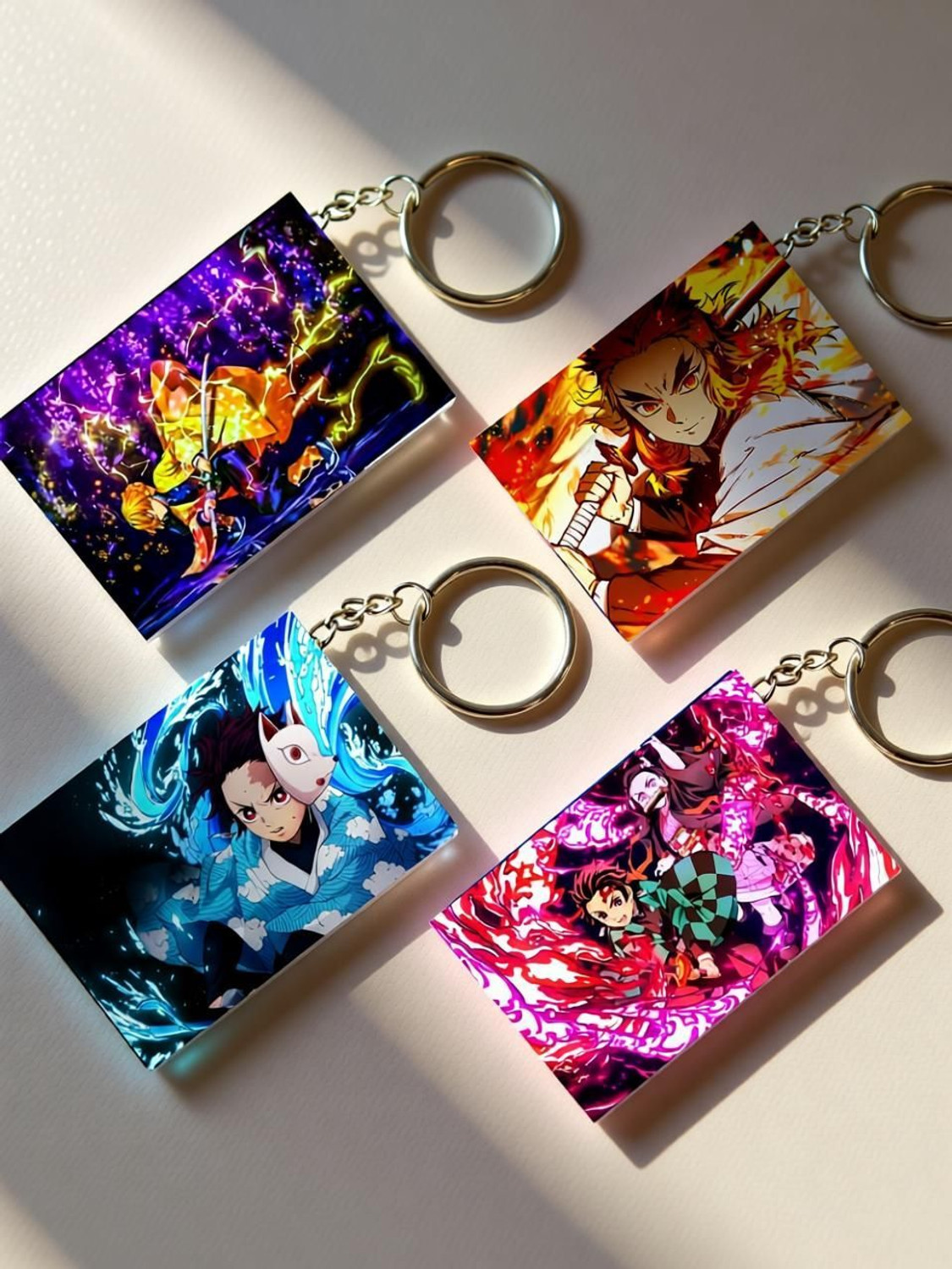 Image of TheInkPalette demon slayer Anime Printed Keychain For Bike, Scooty, Car, bag(Pack of 4) Key Chain