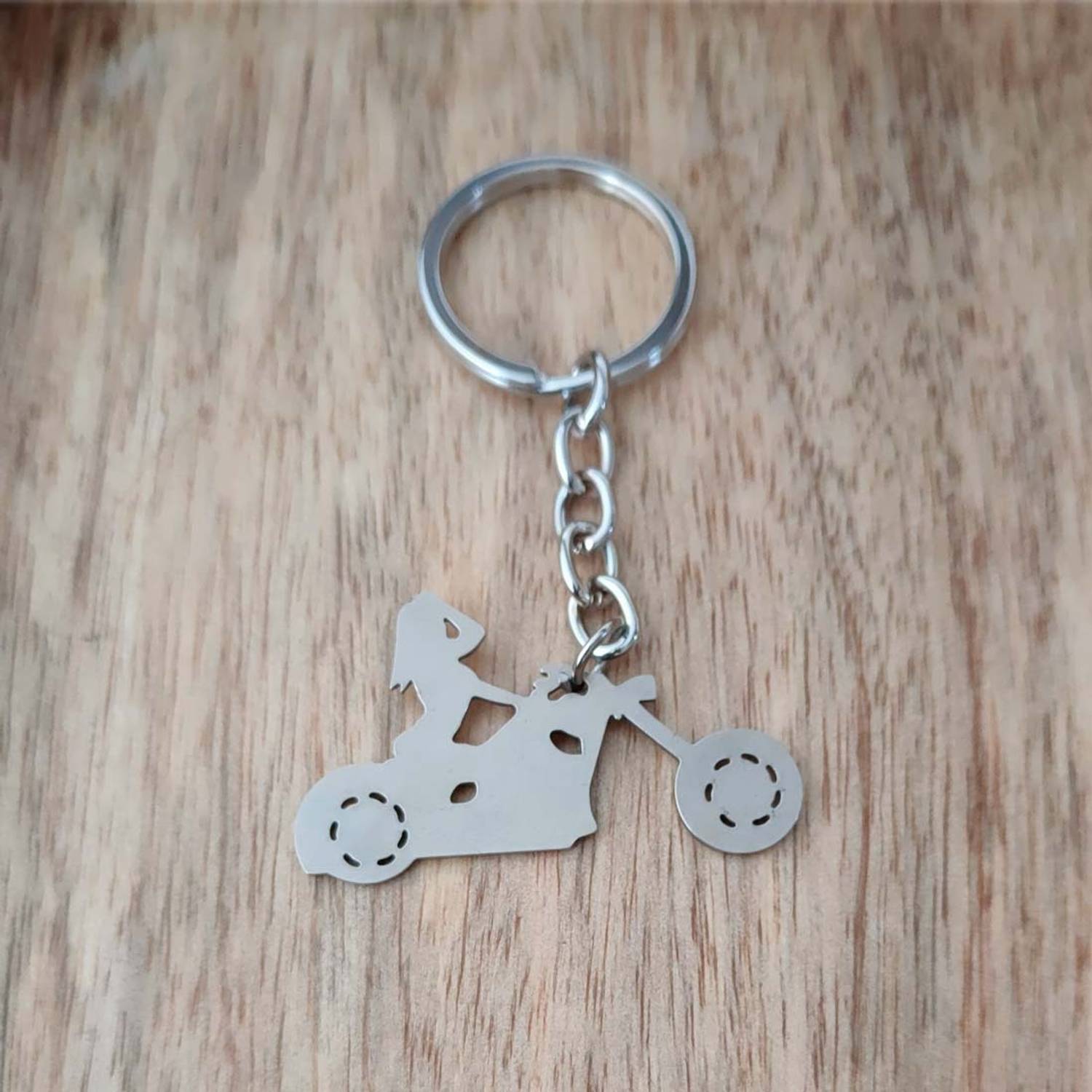 https://rukmini1.flixcart.com/image/1500/1500/xif0q/key-chain/v/z/3/na-personalized-bike-rider-girl-boy-gift-silver-stainless-steel-original-imagzdnfpwg8gggf.jpeg?q=70