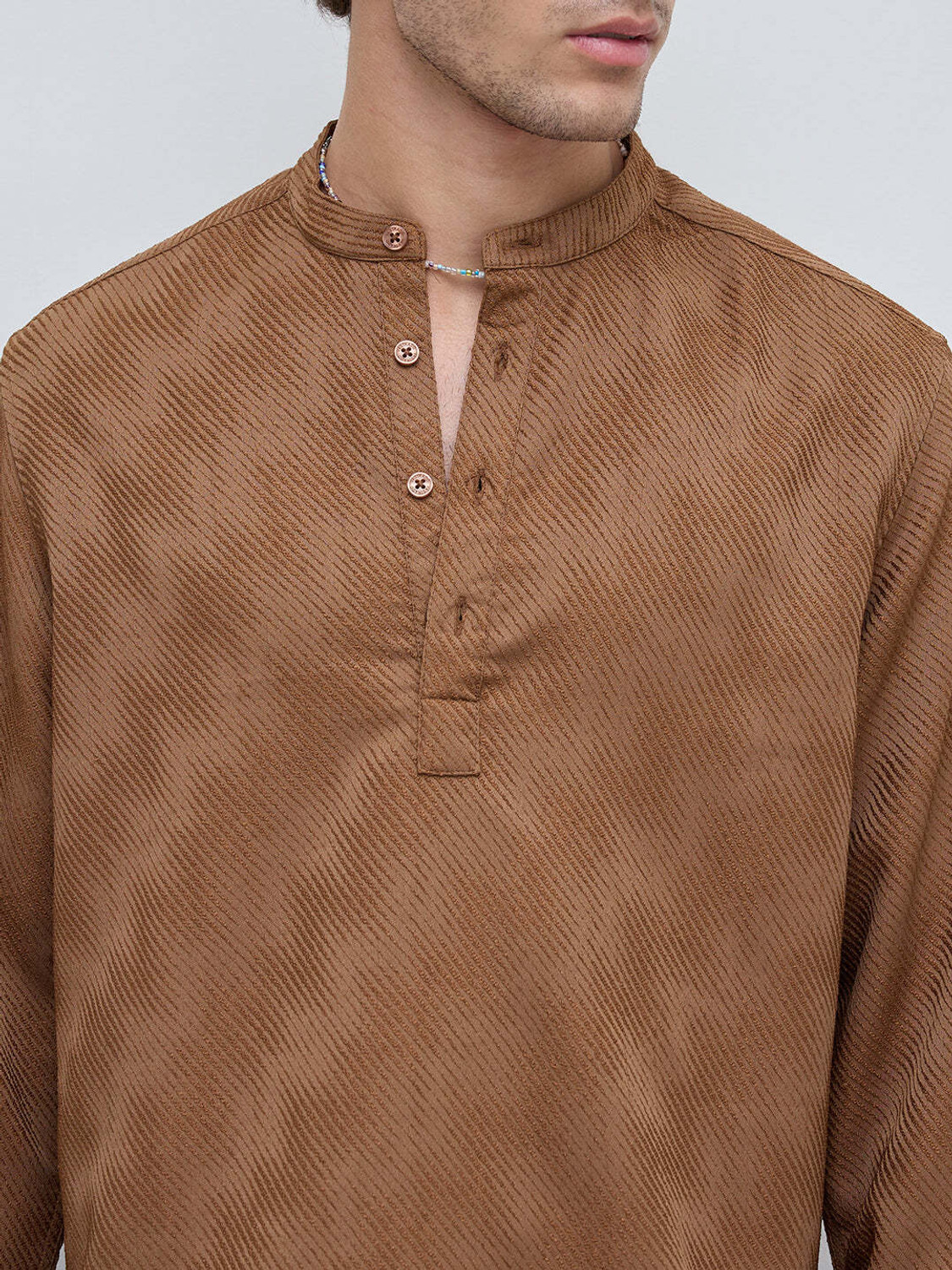 Image of VASTRADO Self Design Polyester Straight Kurta for Men (Brown)